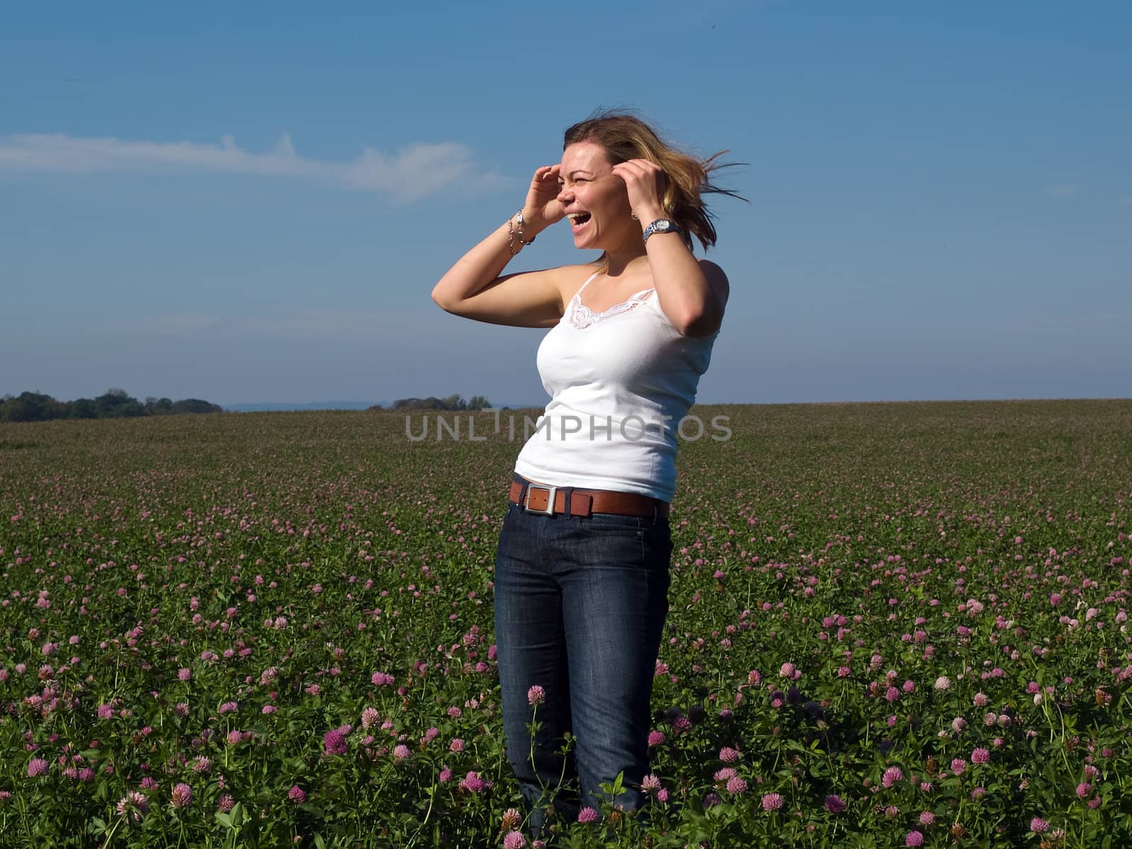 Beautiful young happy woman girl in a field by Ronyzmbow