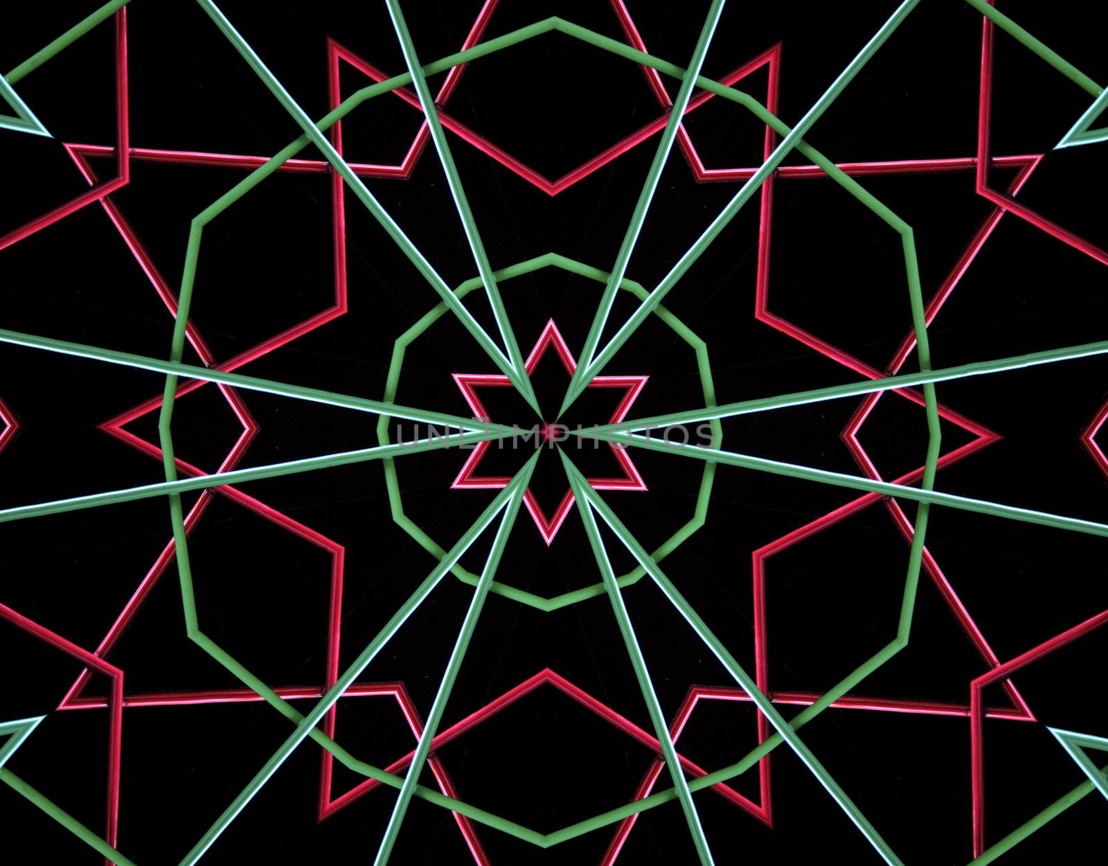 red, green and black abstract with stars in the center