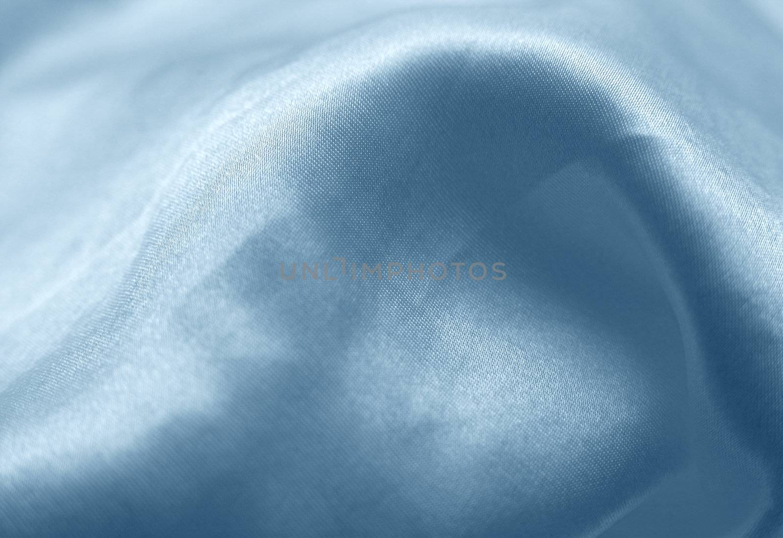 Dark blue silk. A texture close up