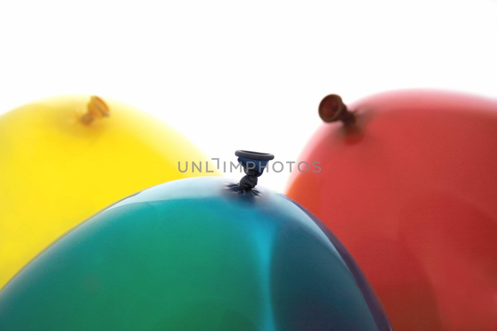 yellow, blue and red balloons by nebari