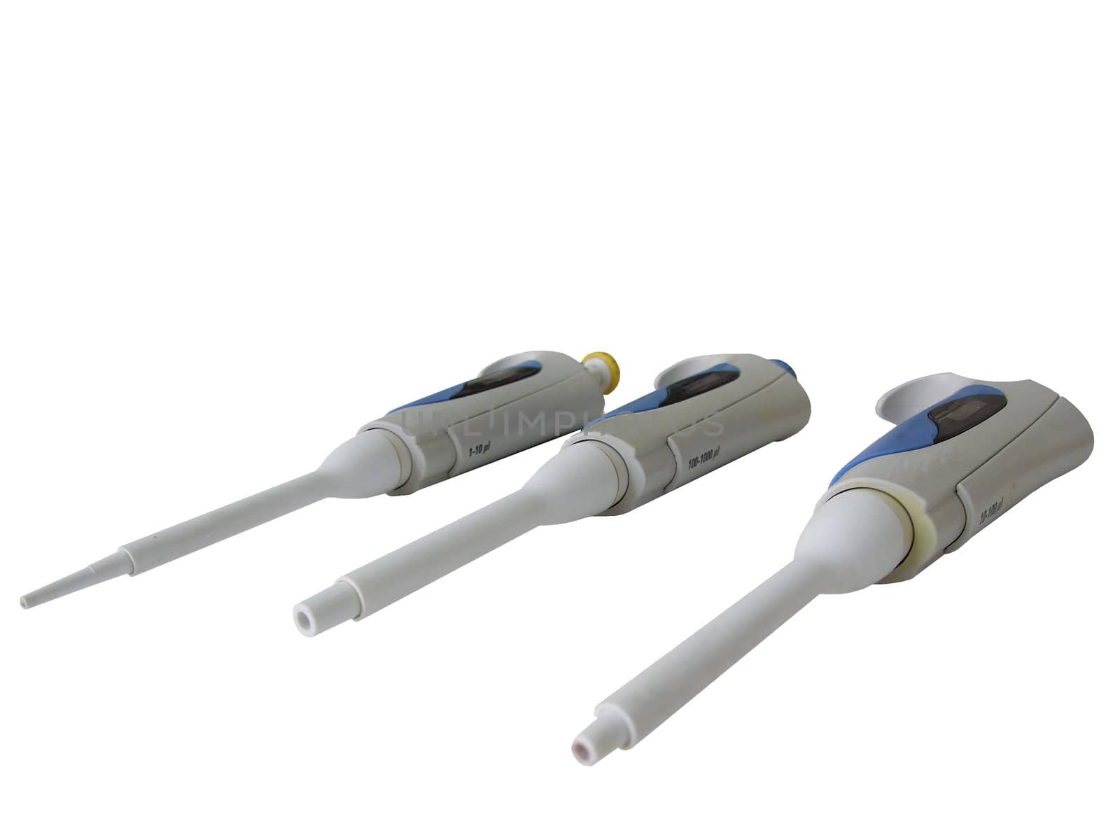 three labolatory pipettes against a white background