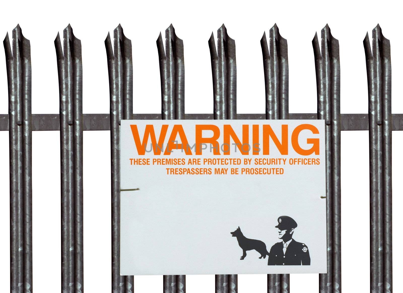 Isolated fence and warning sign around an industrial unit