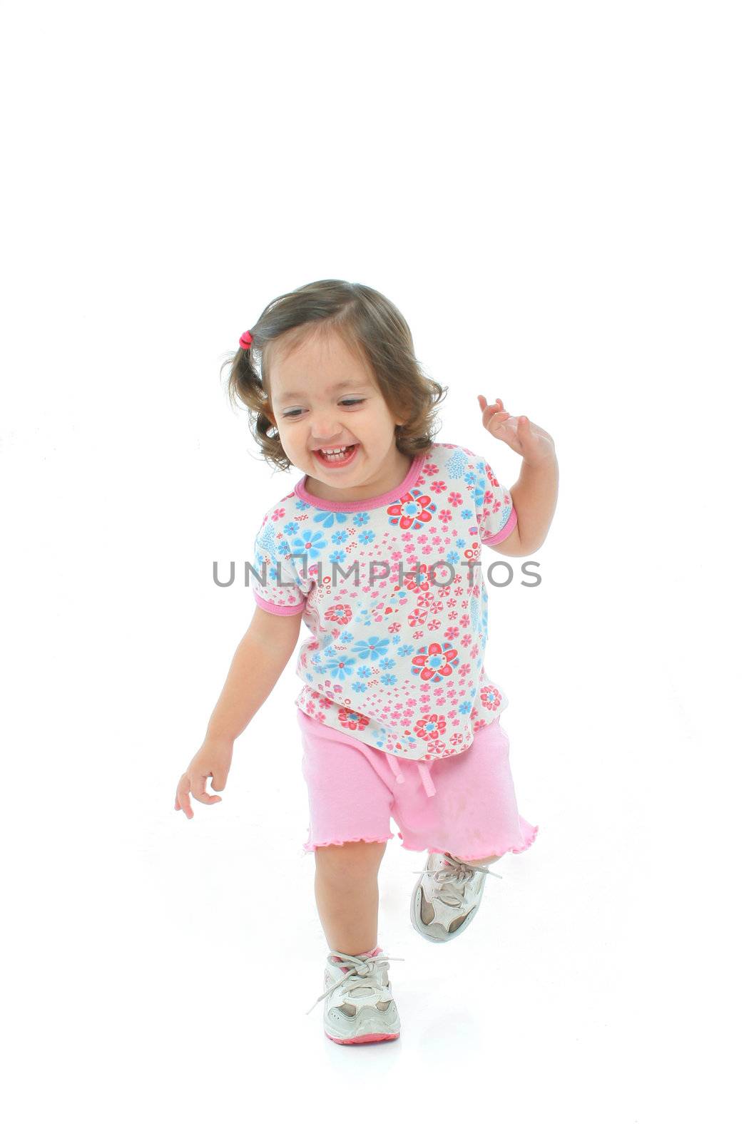 Happy toddler smiling and dancing with a beautiful expression. More pictures of this baby at my gallery
