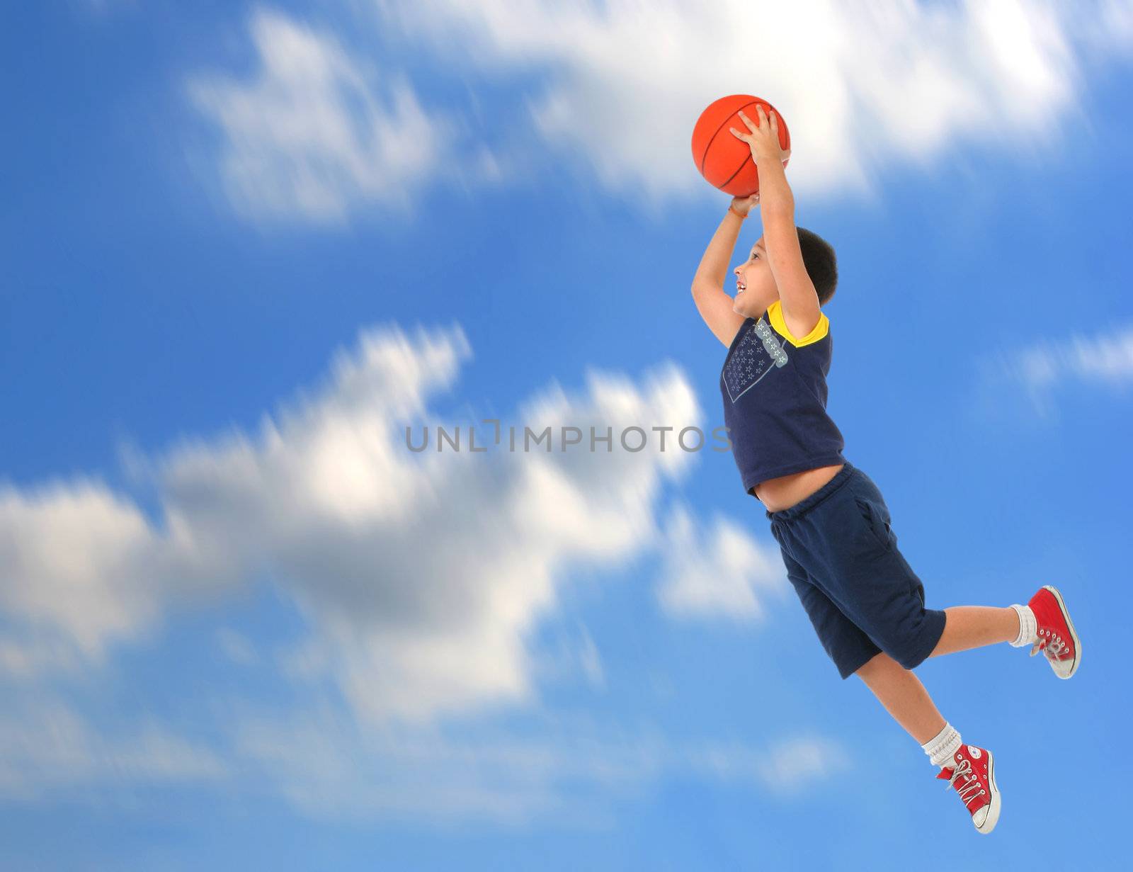 Boy playing basketball jumping and flying by Erdosain