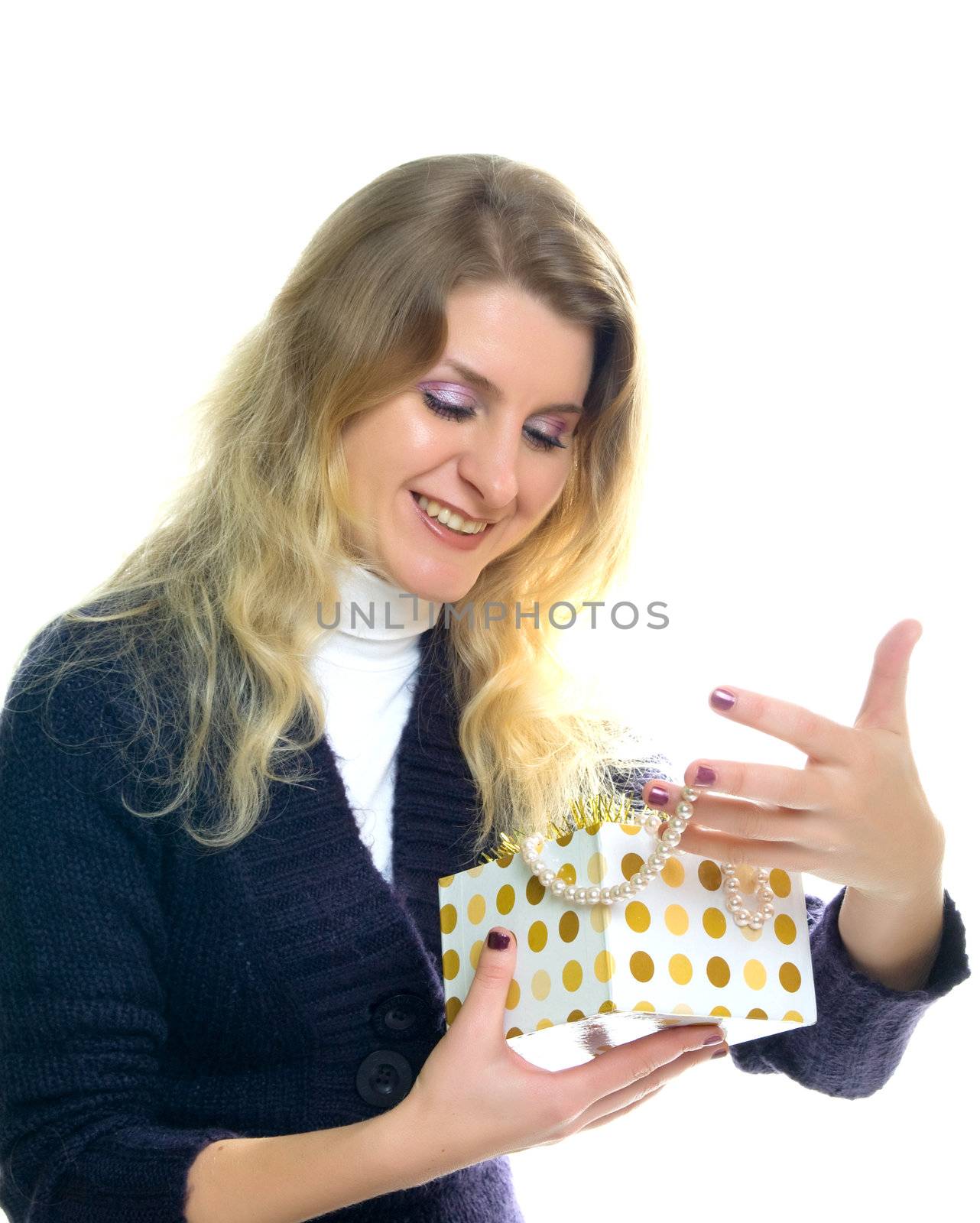 Beautiful happy girl with a gift. Isolated on white 