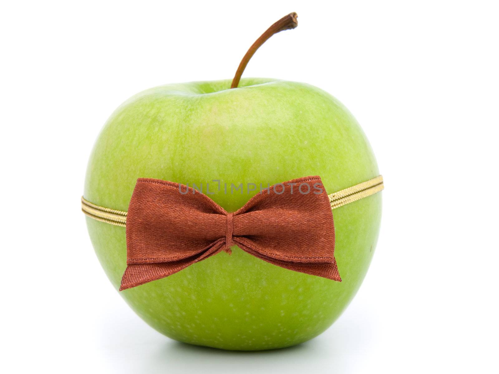 green apple with bow-tie isolated on white background 