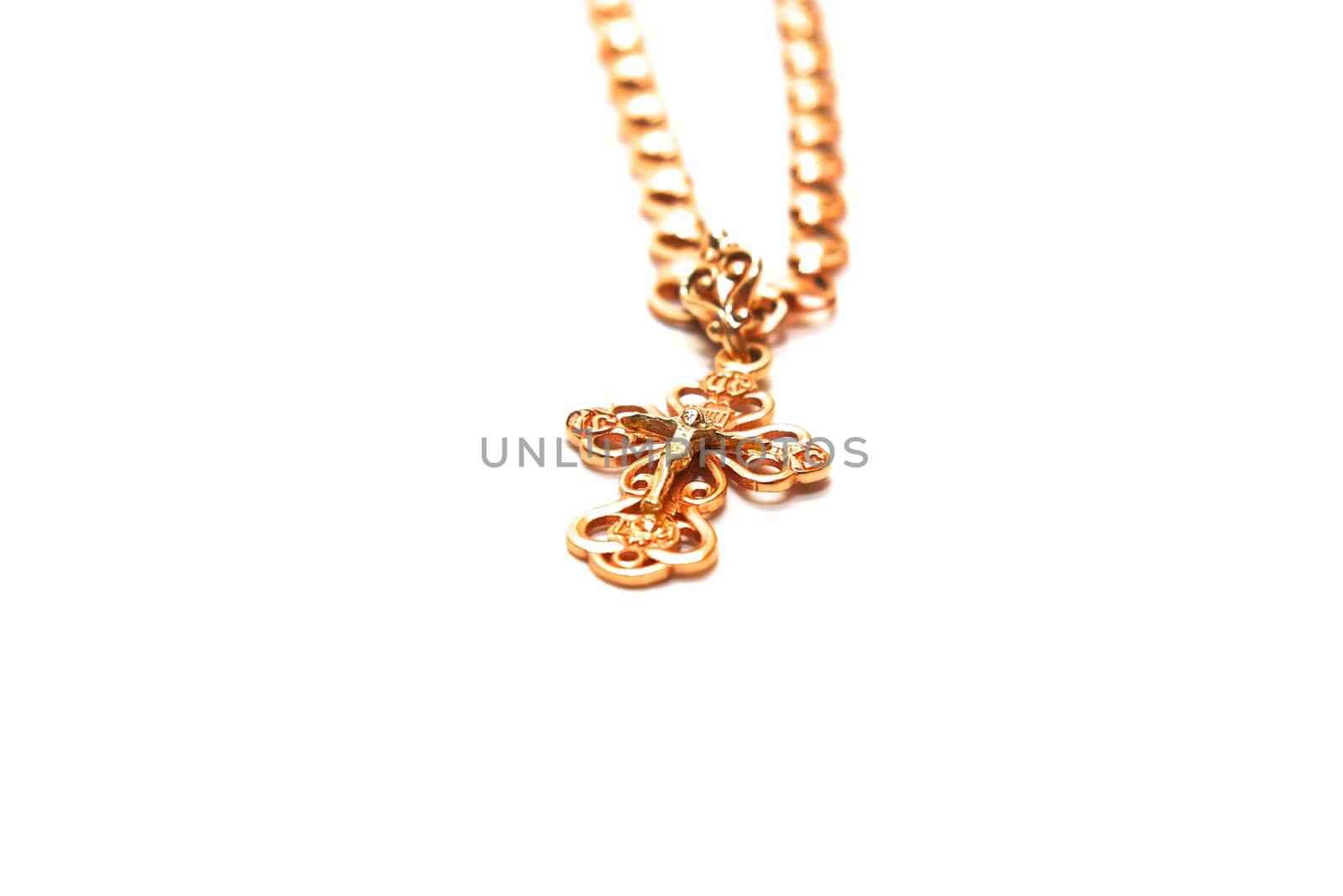 photo of the gold cross on white background