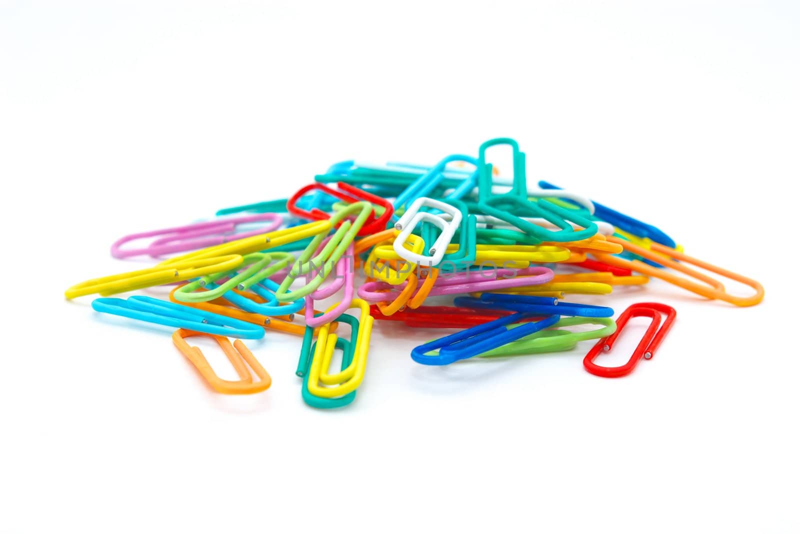 photo of the paperclips on white background