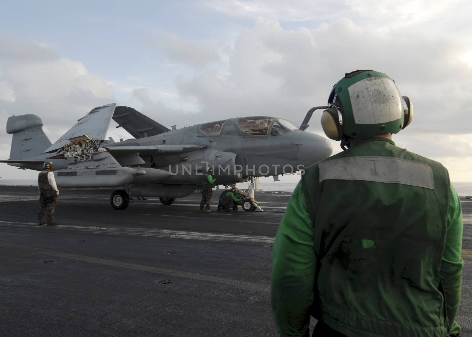 A Prowler taxis forward to launch from an aircraft carrier