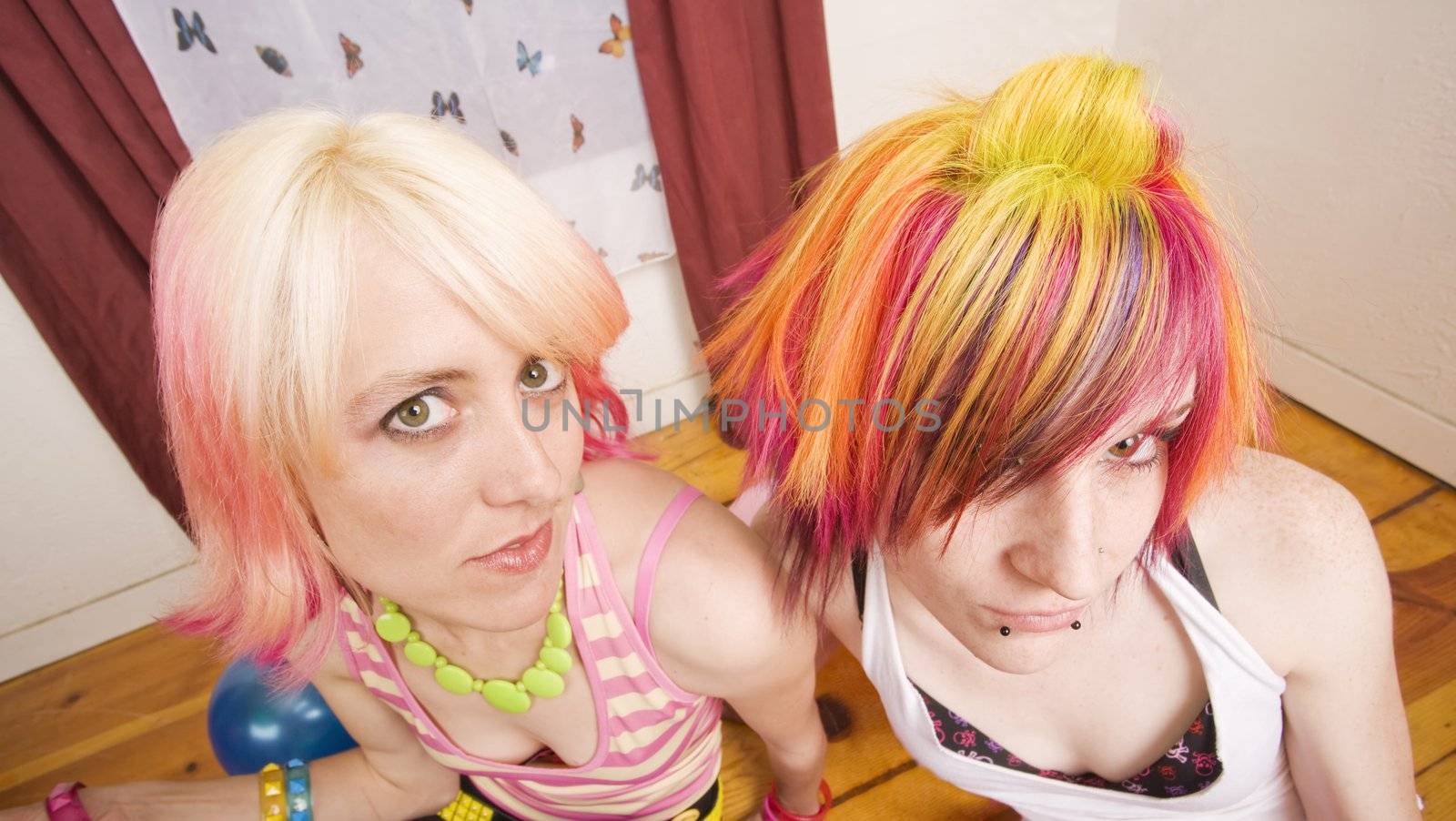 Two colorful hipster girls with brightly dyed hair