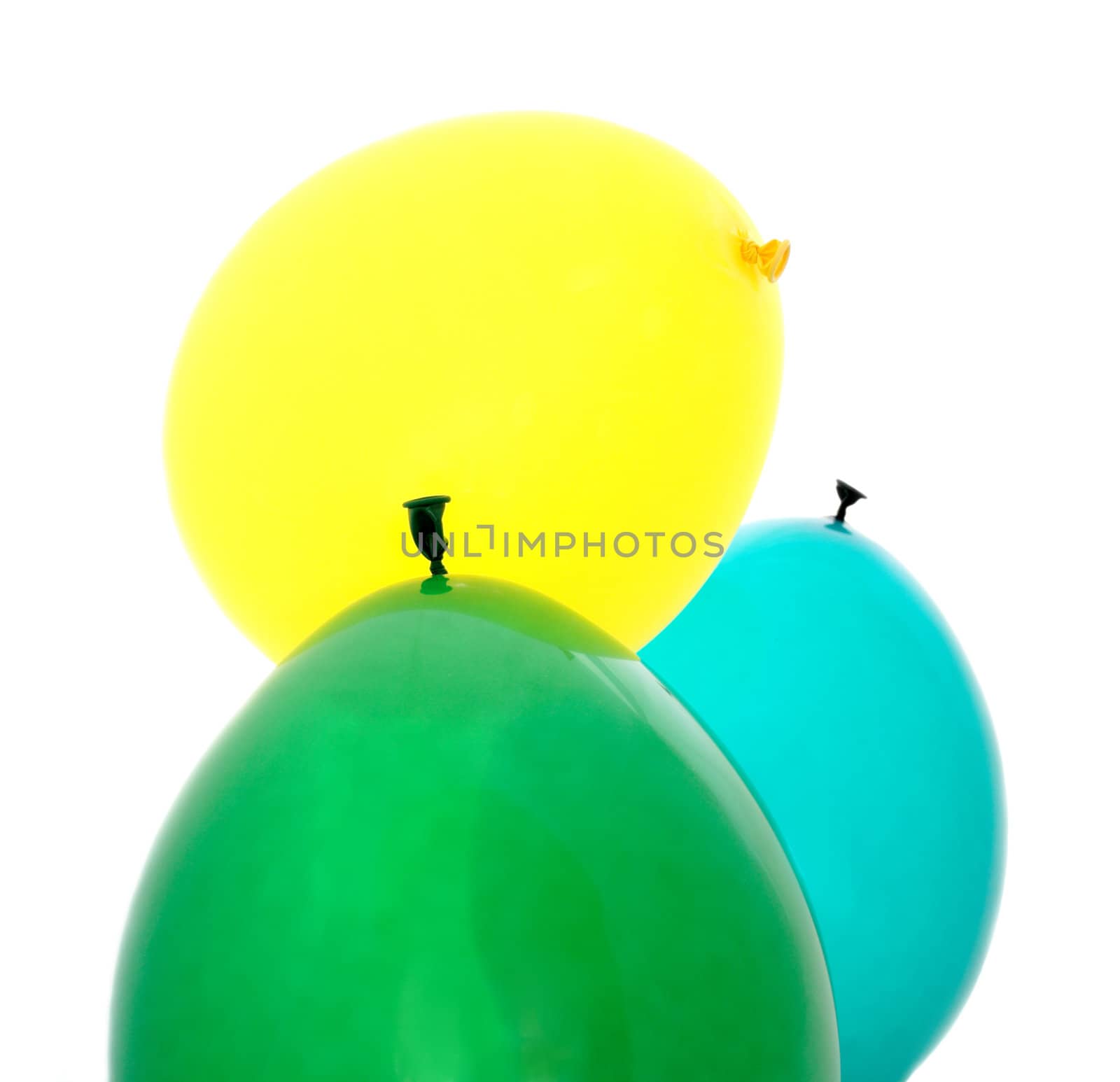 yellow, green and blue balloons isolated on white