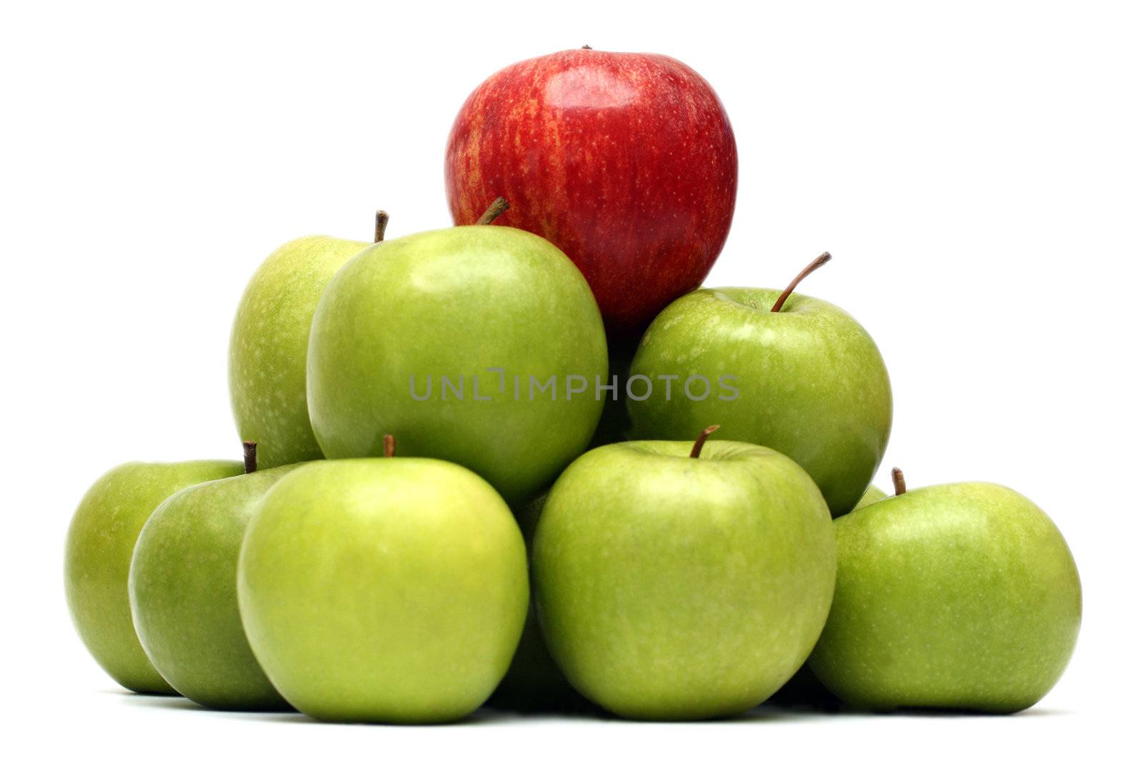 domination concepts - red apple between green apples