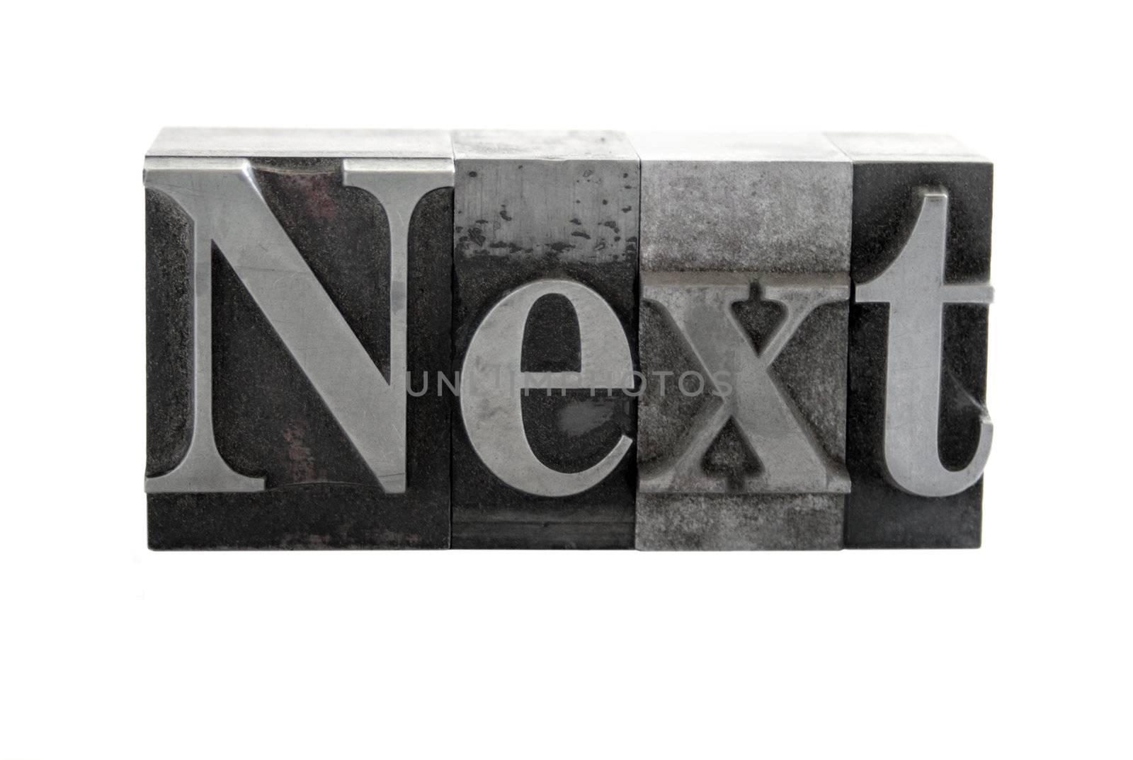 next in metal letters by nebari