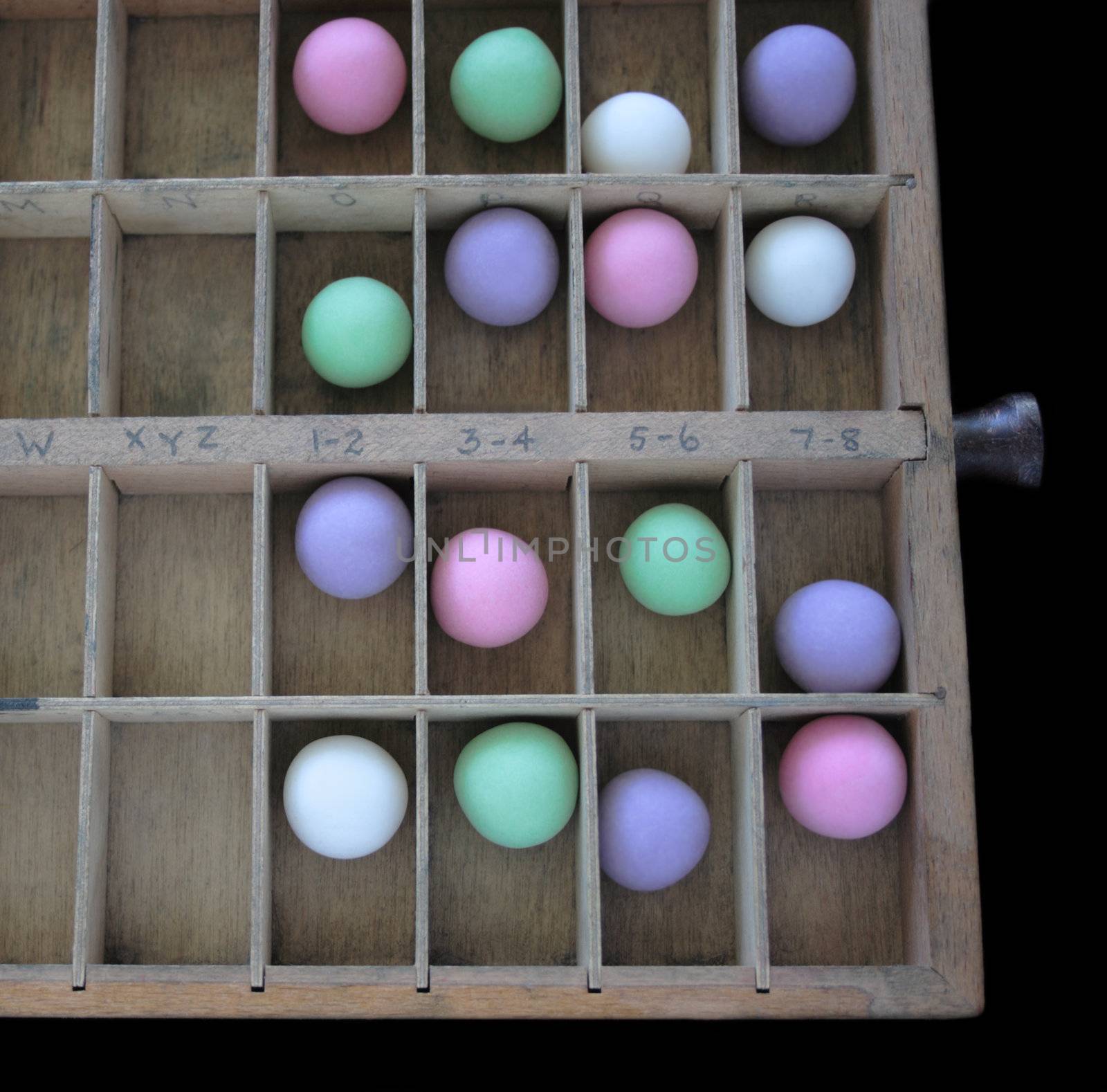 pastel balls in a type case by nebari