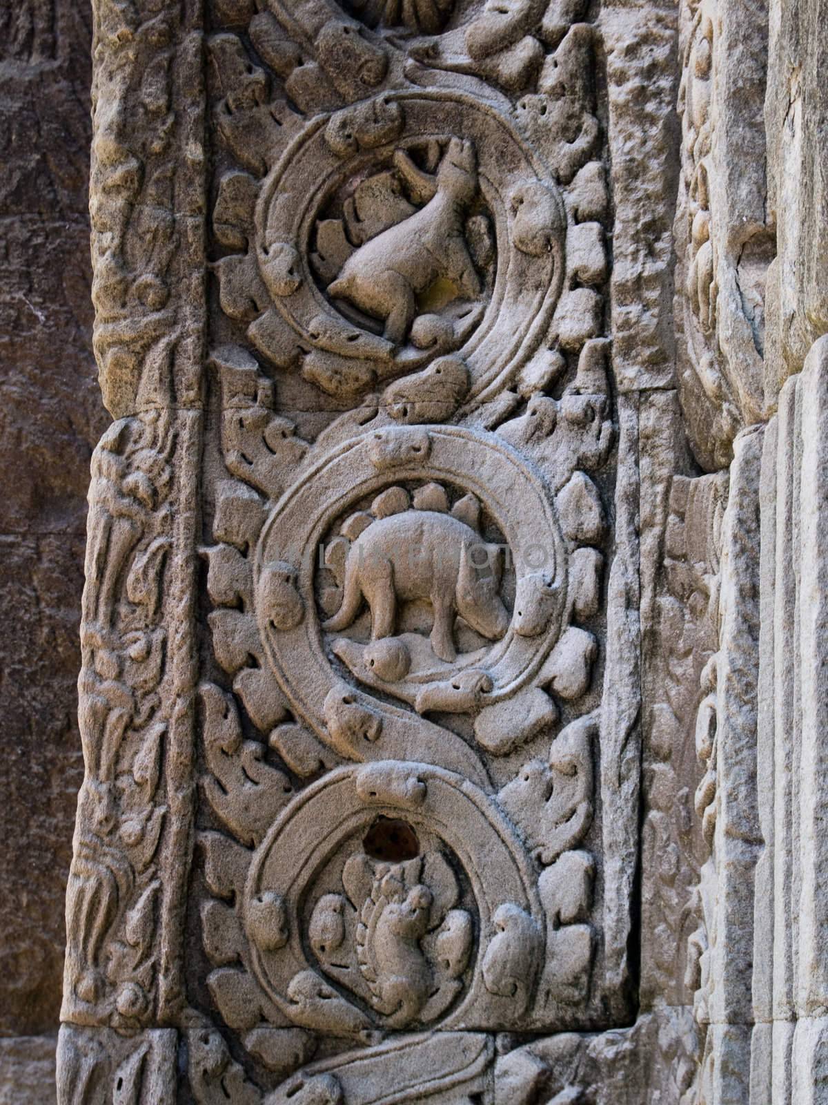 a picture of dinosauros at the cambodia temple