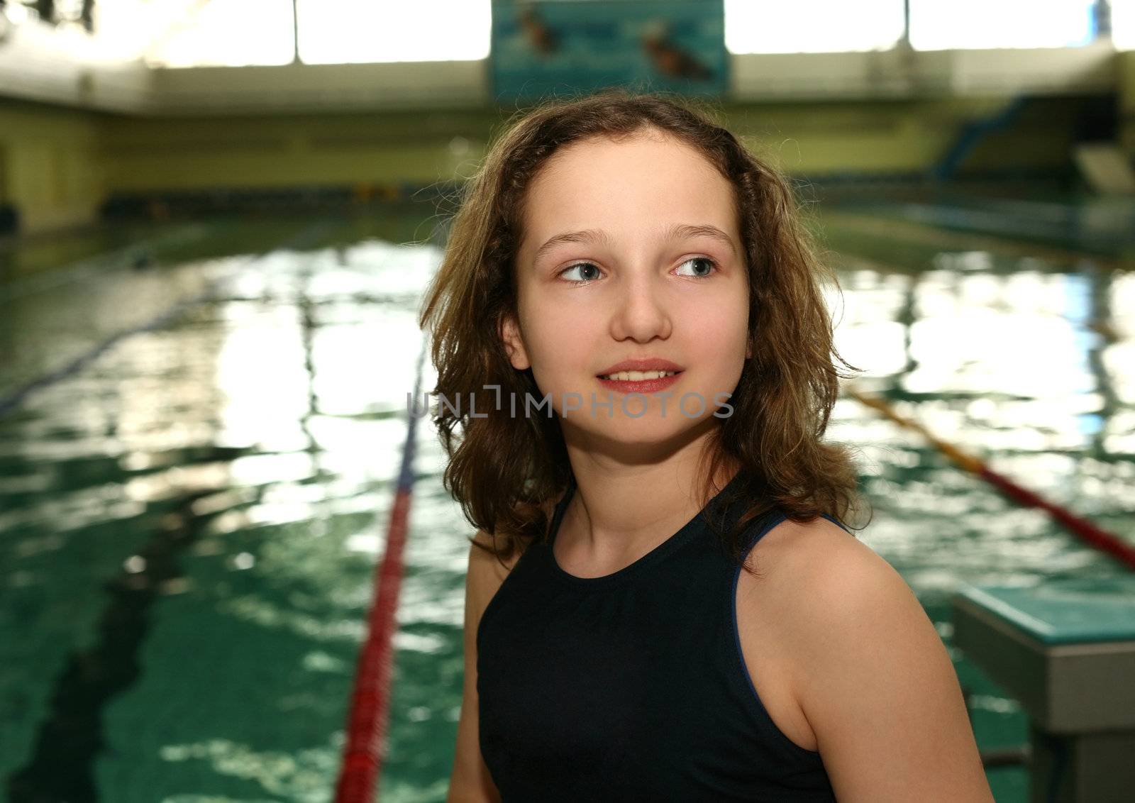 The young sportsman on a background of pool