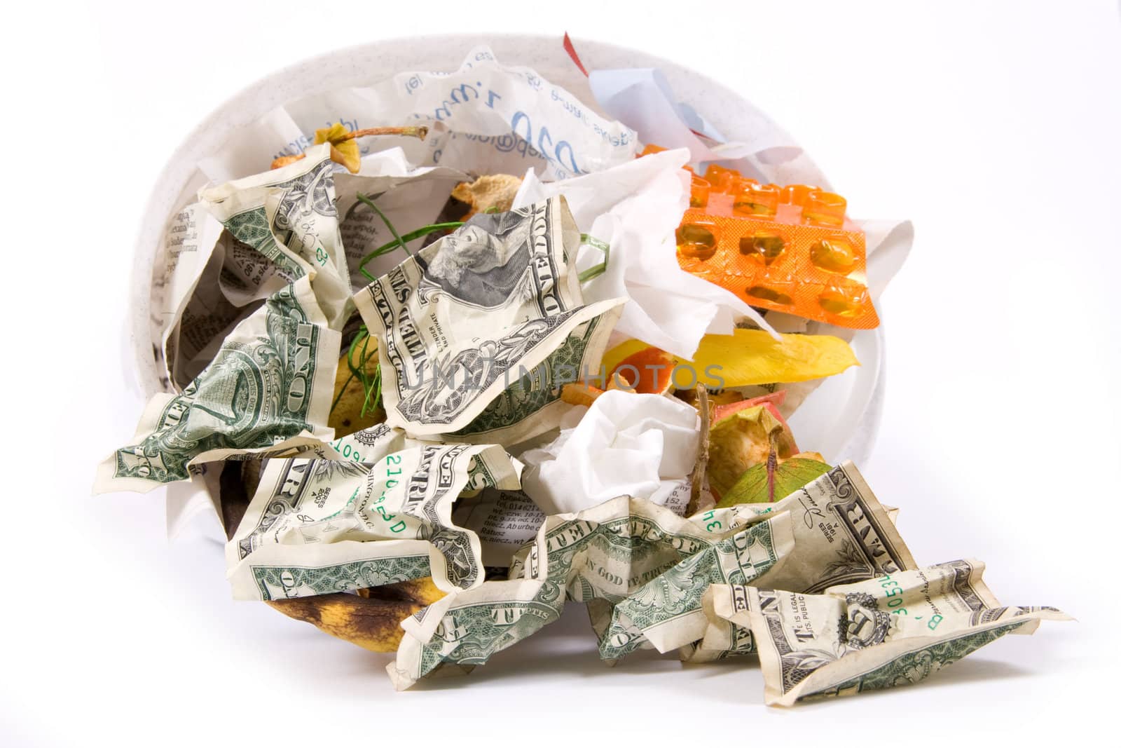 Dollar banknotes in rubbish bin