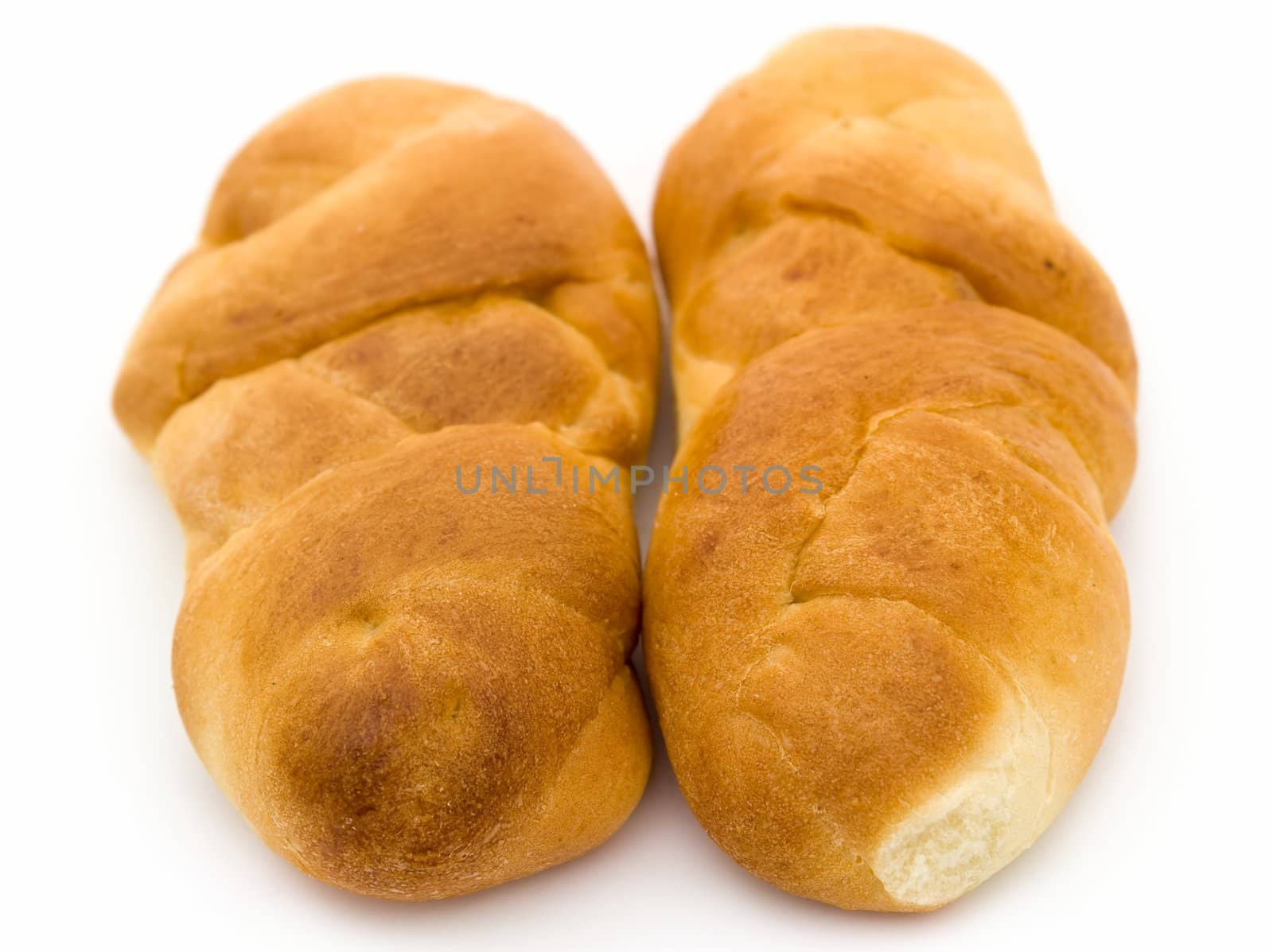 Two appetizing buns on a white background