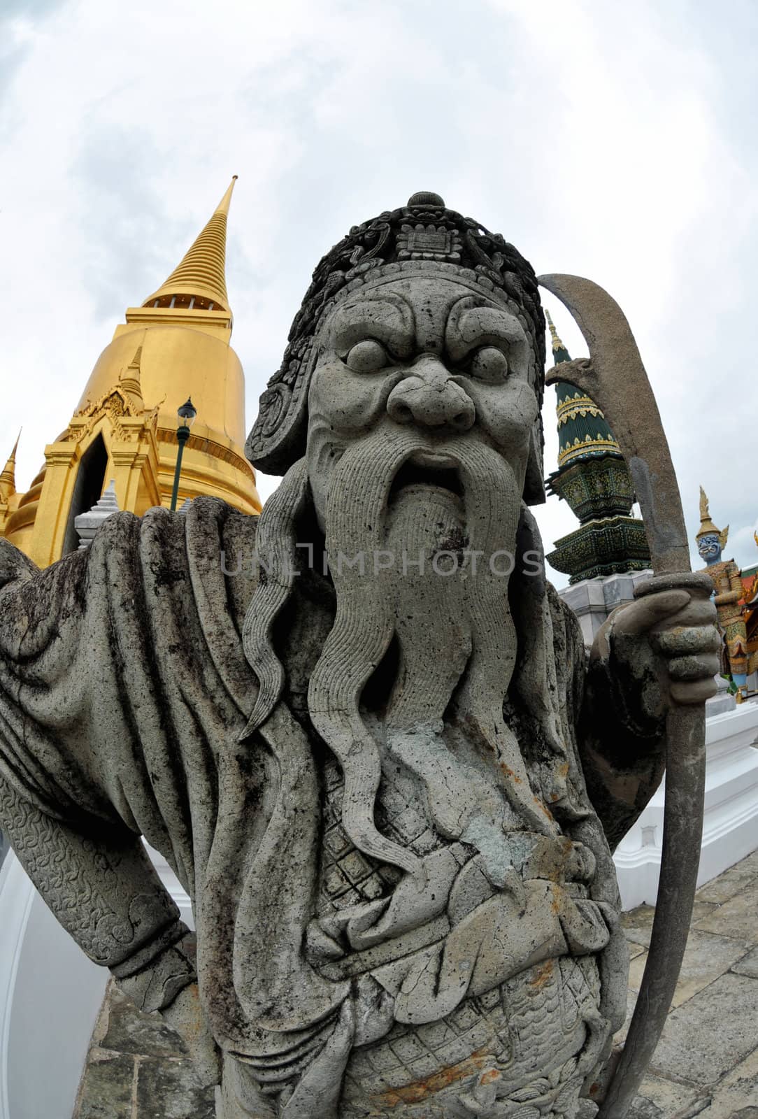Guardian statue (yak) at the temple Wat phra kaew in the Grand palace area,
one of the major tourism attractions in Bangkok, Thailand

