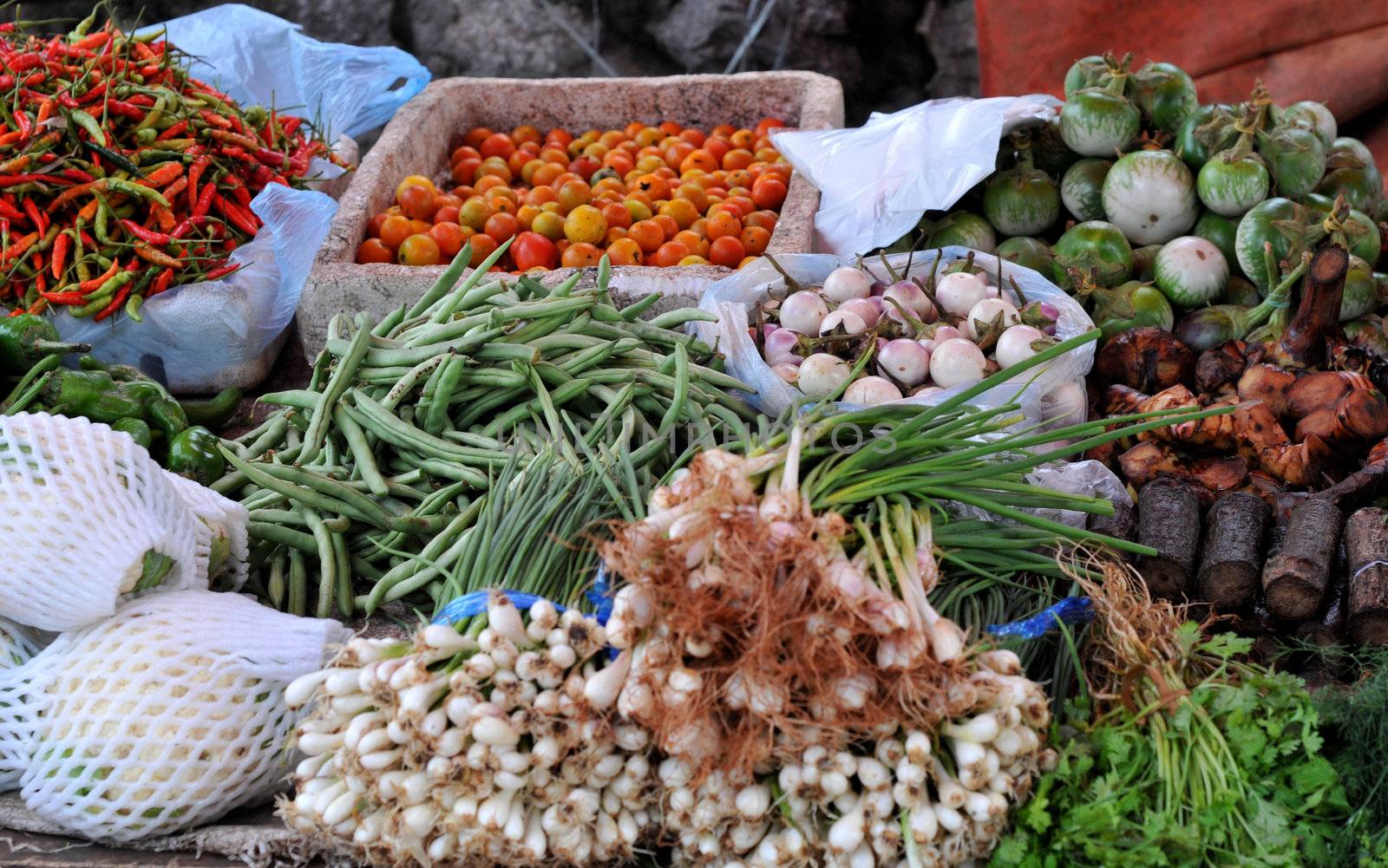 the morning market in luang prabang/laos:fresh fruits and exotic vegetables are sold here daily.