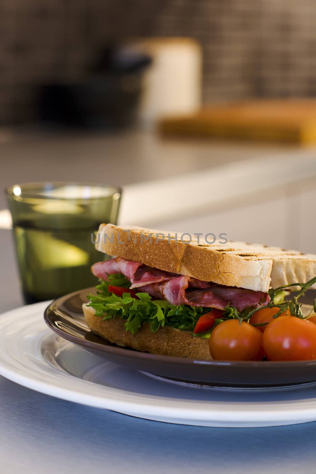 Bacon and lettuce sandwich on the kitchen table 