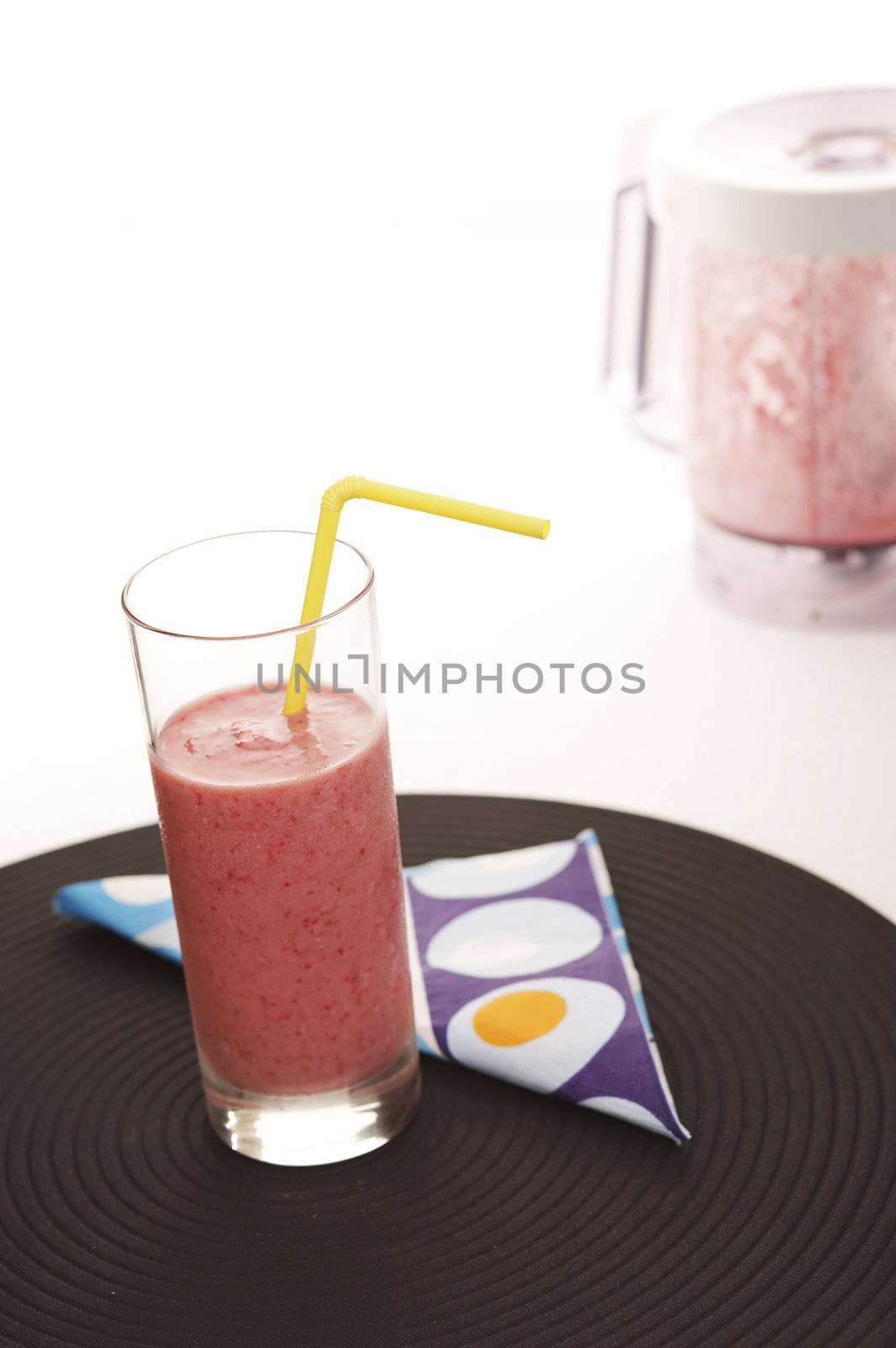 Strawberry milk shake on the white table