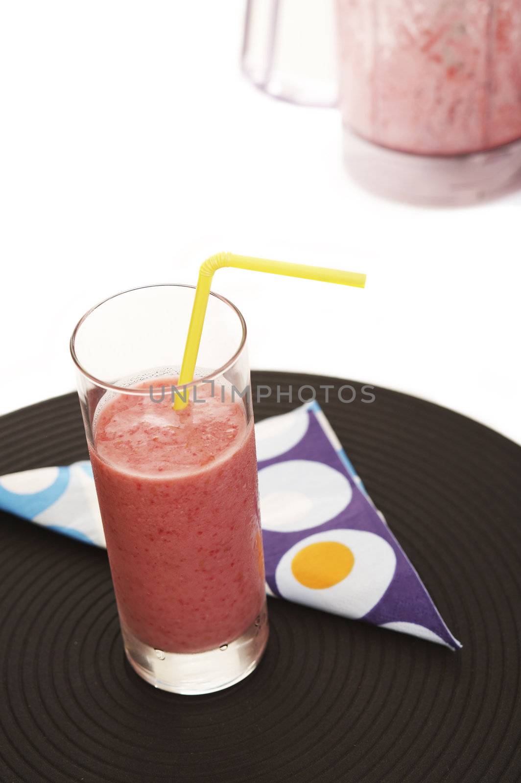 Strawberry milk shake on the white table