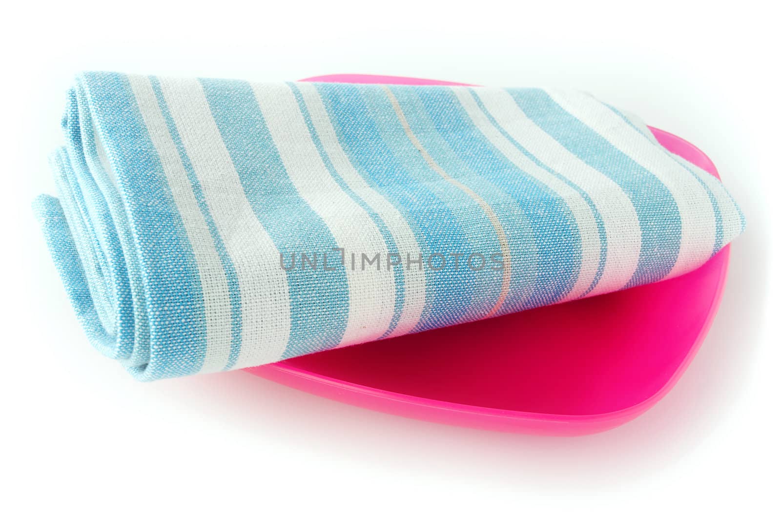 Striped and gridded towel on the plastic plate