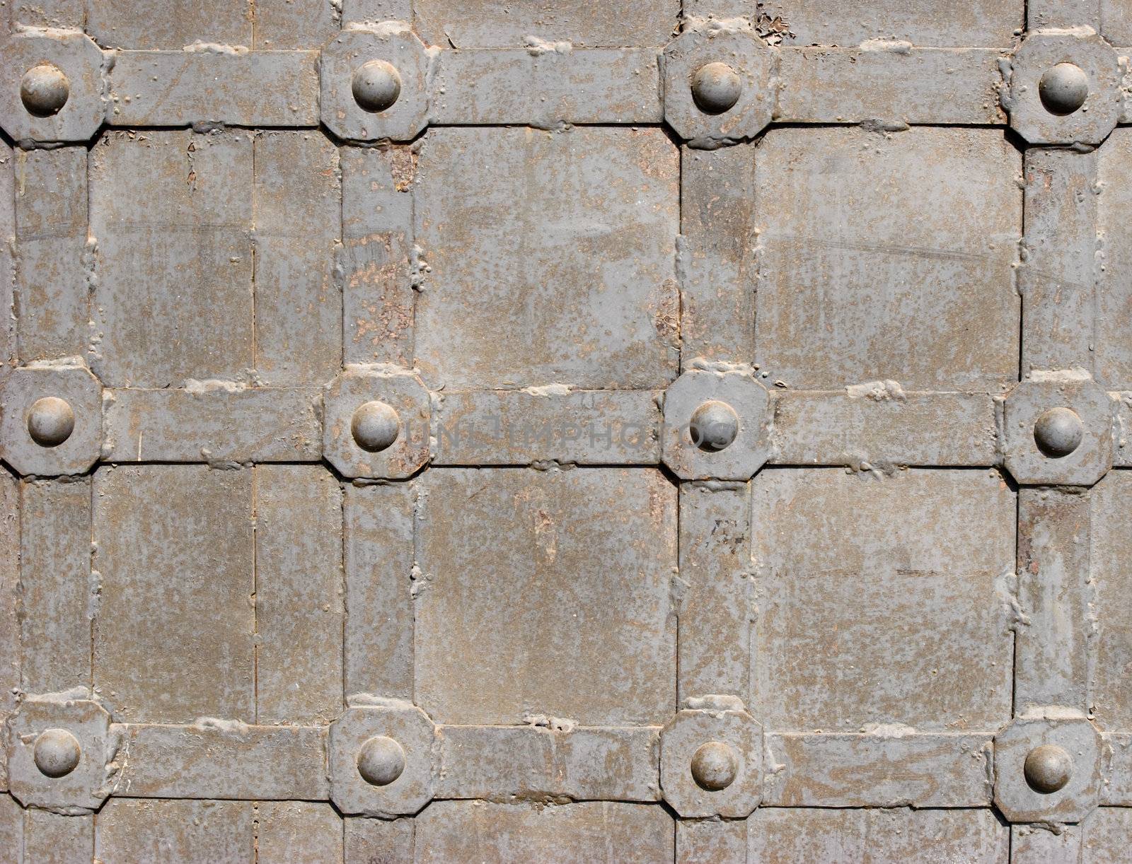 Fragment of the weathered steel monastery door
