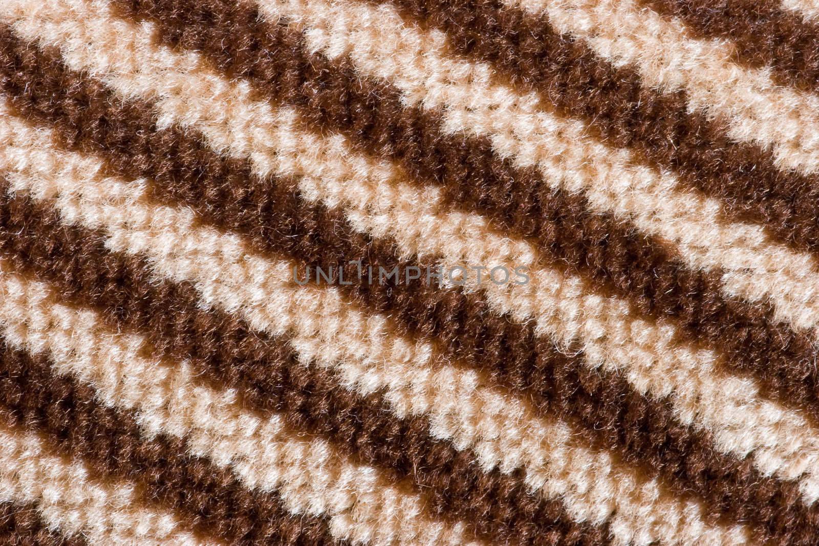 Brown striped fabric pattern close-up
