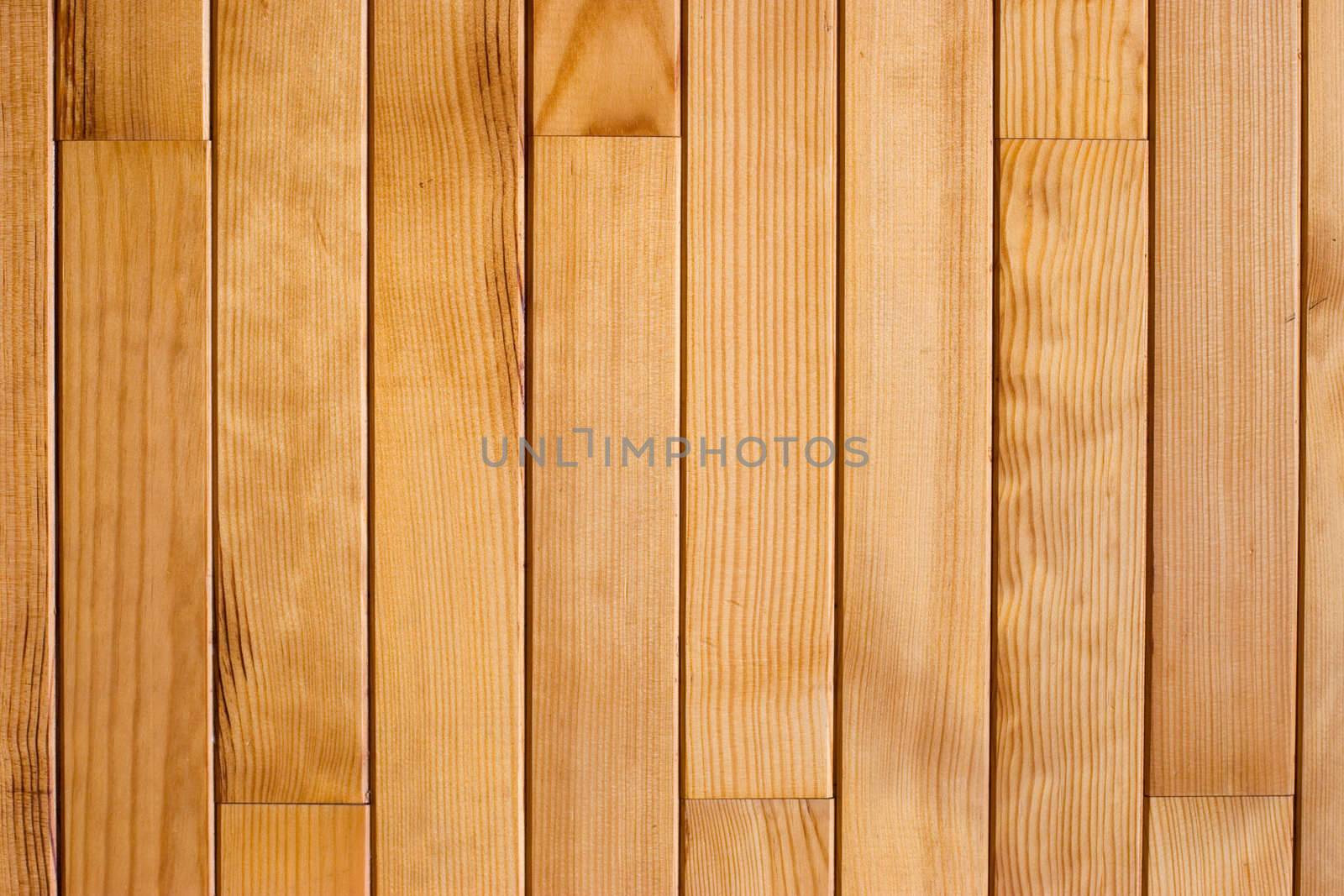 The wall decorated by varnished wooden planks background pattern