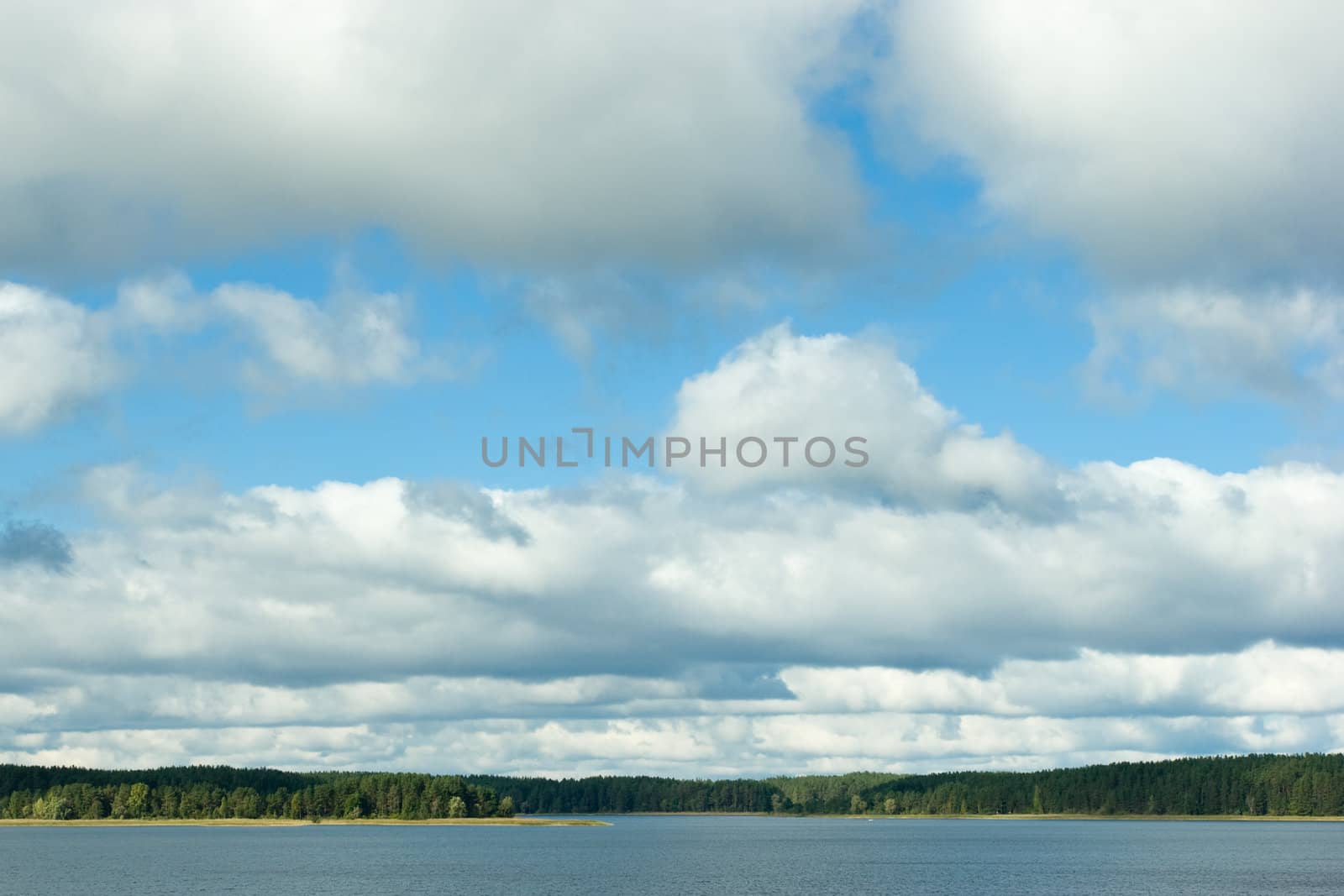 Clouds over lake by naumoid