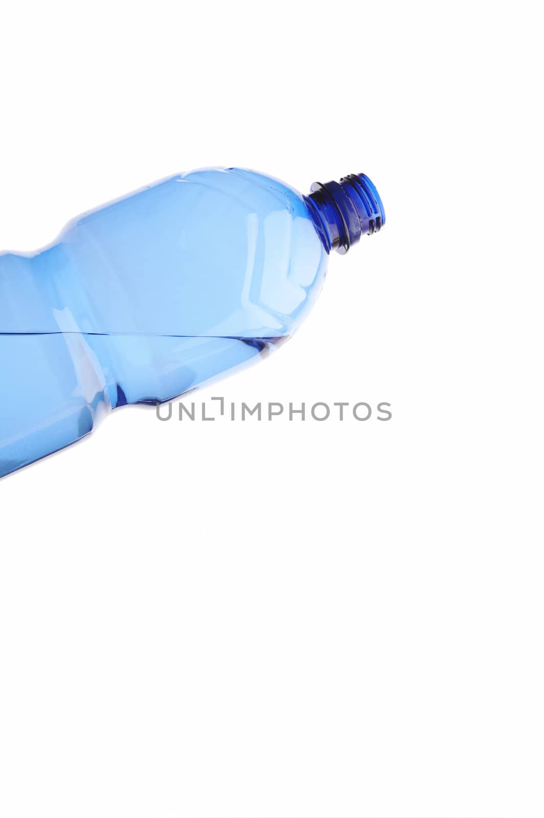 Pouring water from blue plastic water bottle