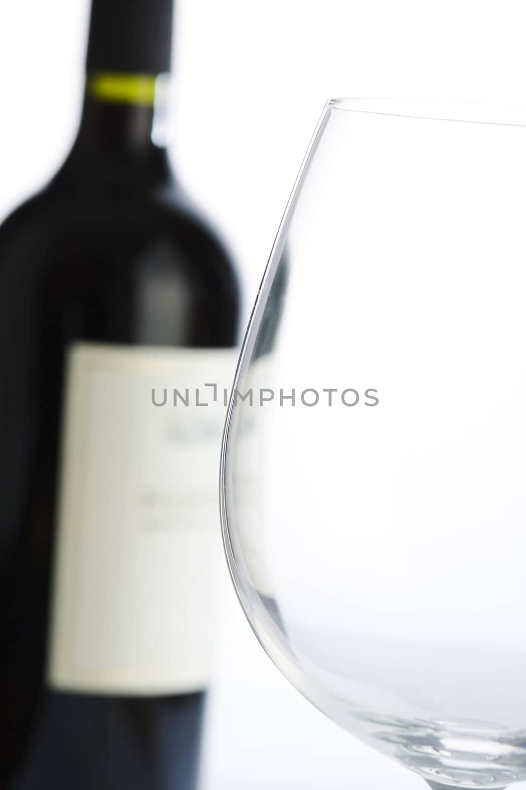 Glass and red wine bottle by mjp