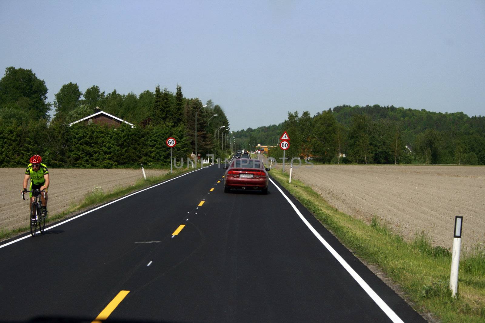 new road, bicycle, cars in Vestfold, Norway