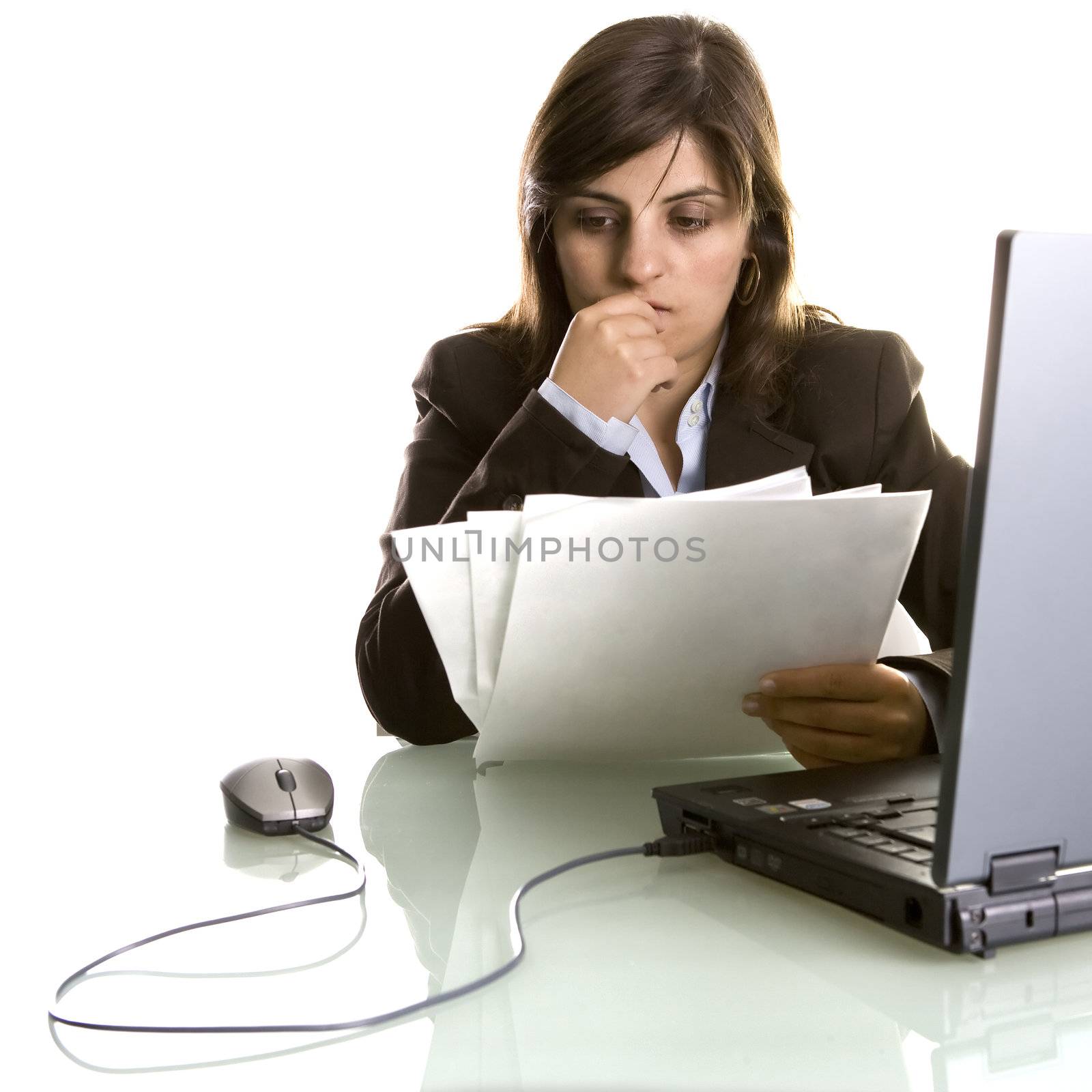 businesswoman thinking with reports in the hand