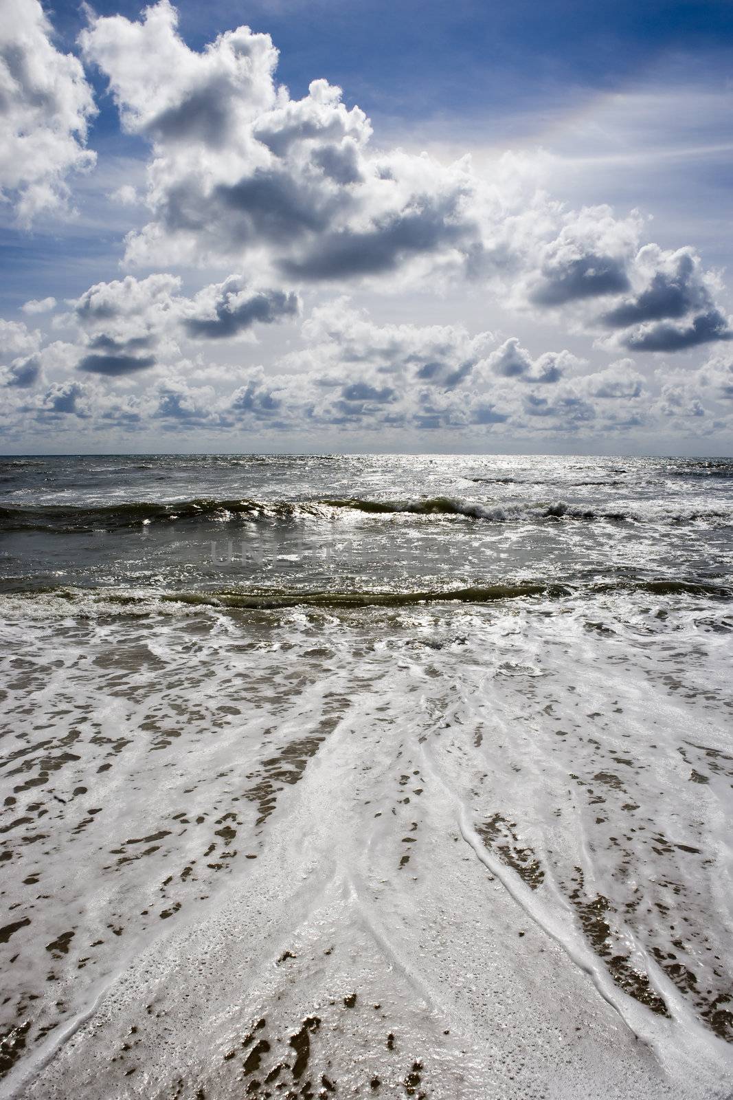 beach seascape with deep blue sky