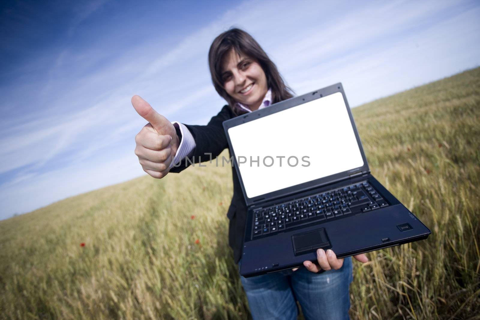 young businesswoman outdoor with laptop - focus on the hand and laptop