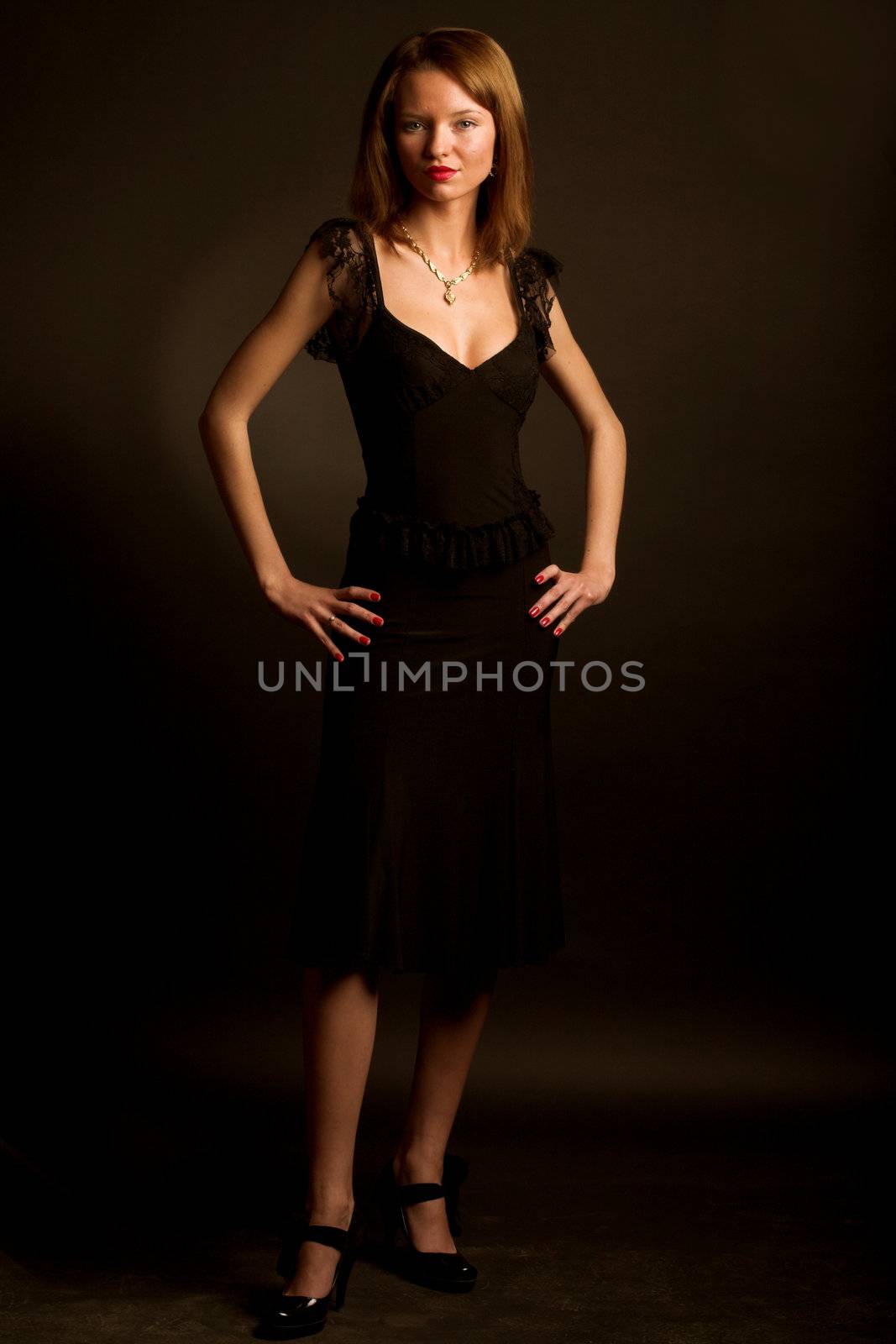 Young glamor woman in black dress