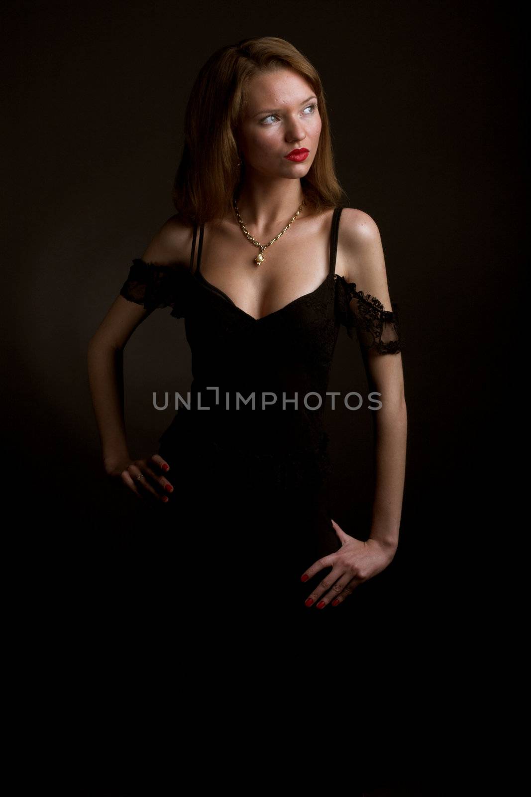 Young glamor woman in black dress