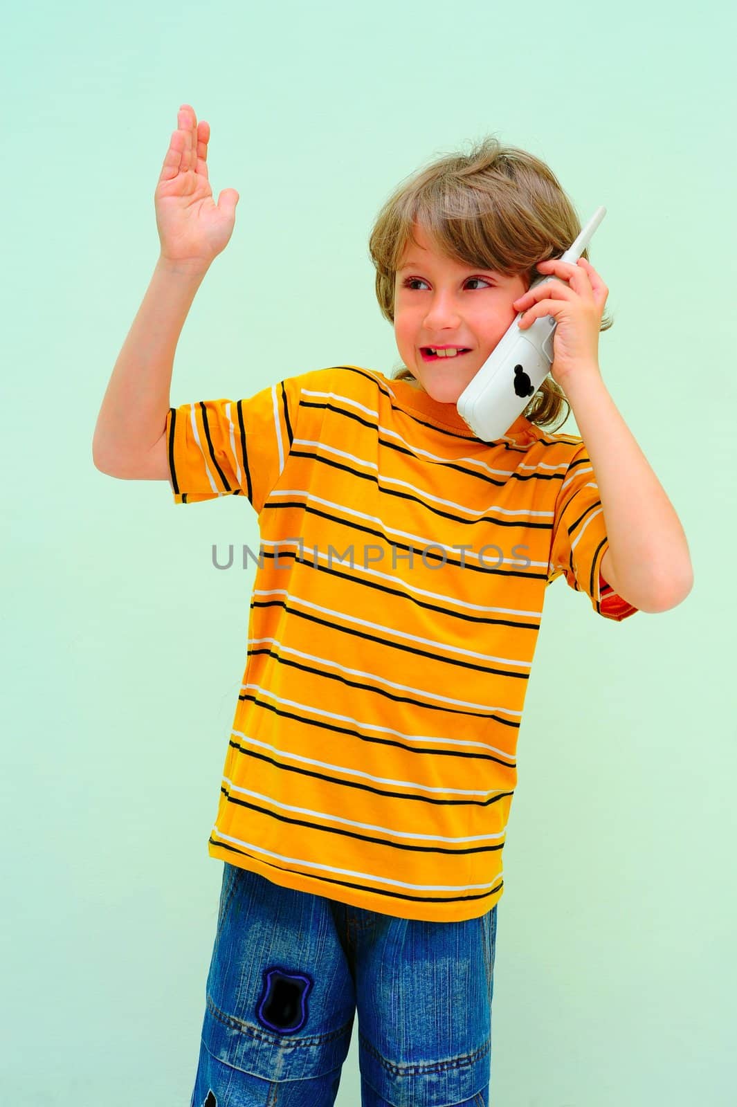 Teen Boy Relax By Talking On Wireless Telephone.
