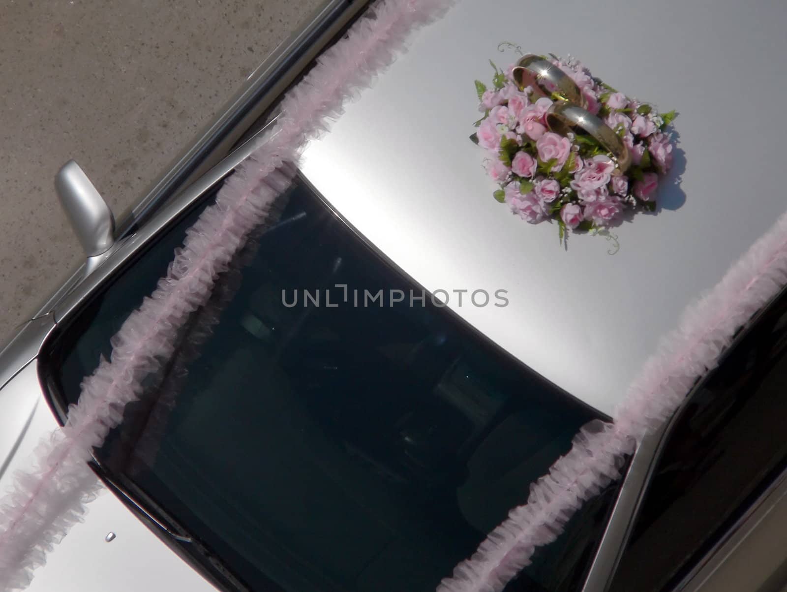 Car with weddings rings 