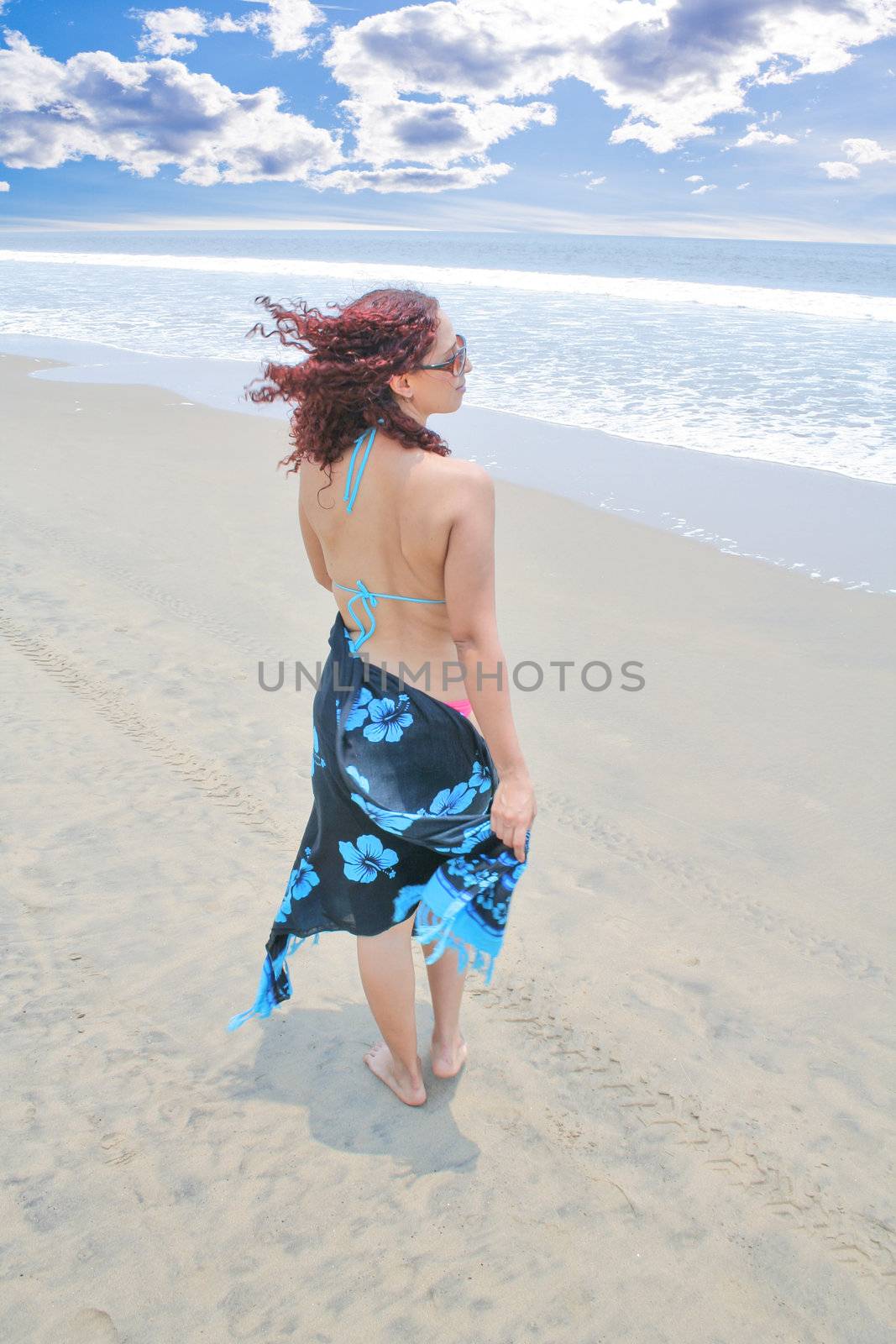 young woman enjoying time on the beach