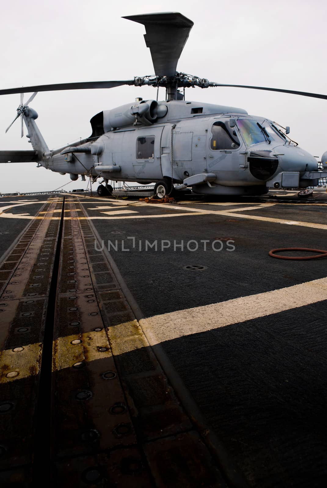 US Navy rescue helicopter on board the fight deck of USS Chafee (DDG90) while at sea on deployment.