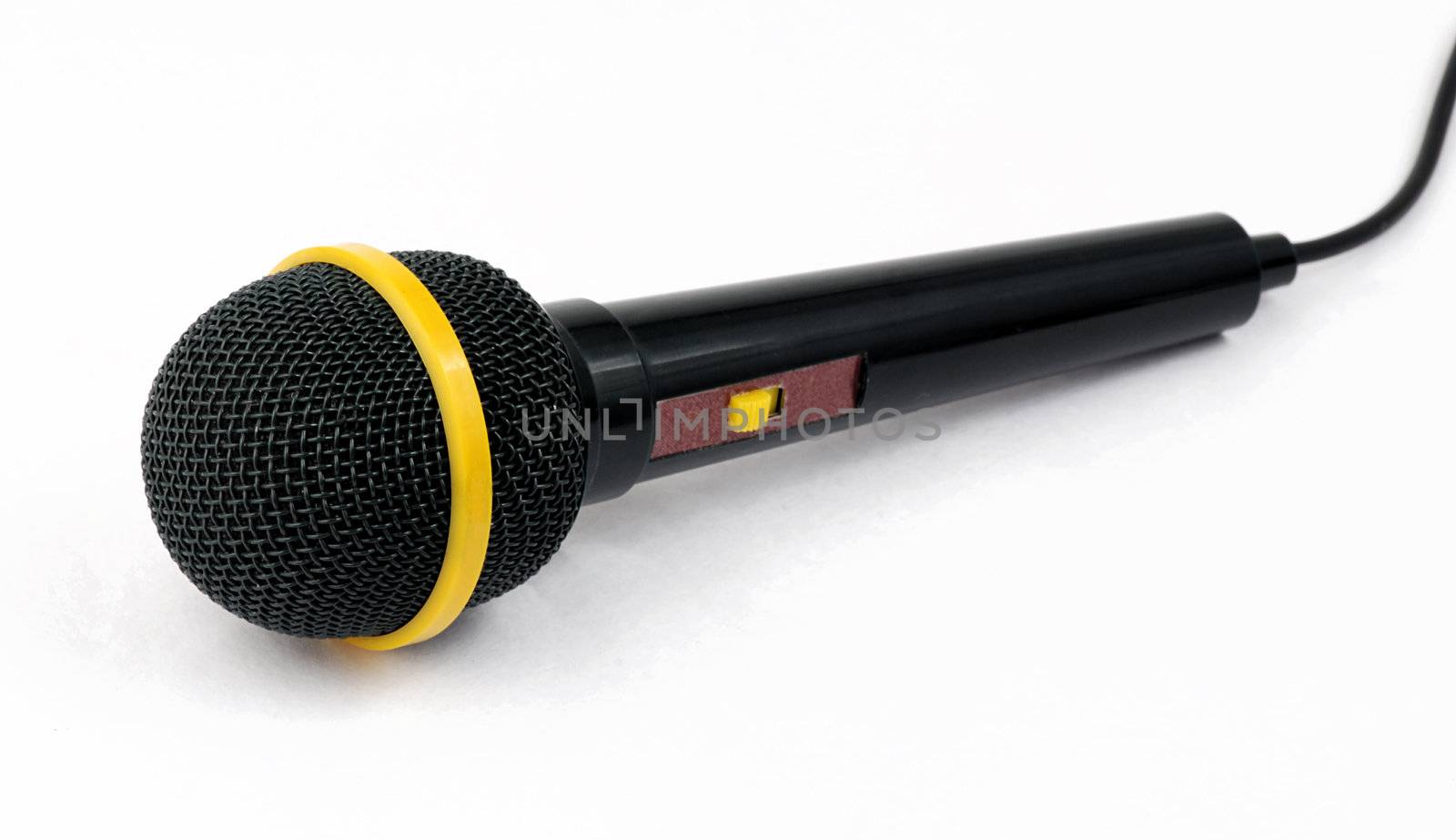 Black microphone for singing isolated on white background

