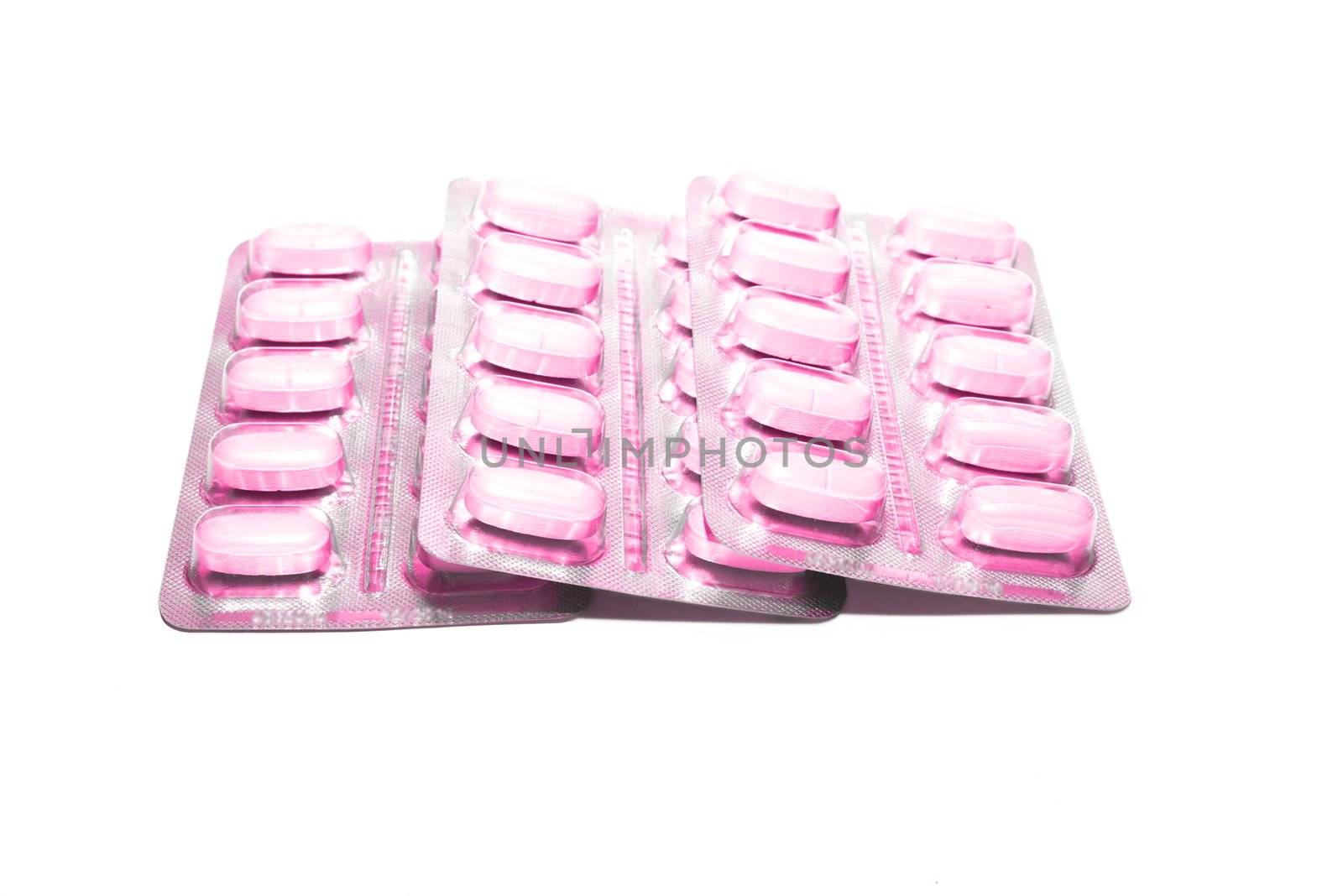 photo of the packings of pills on white background