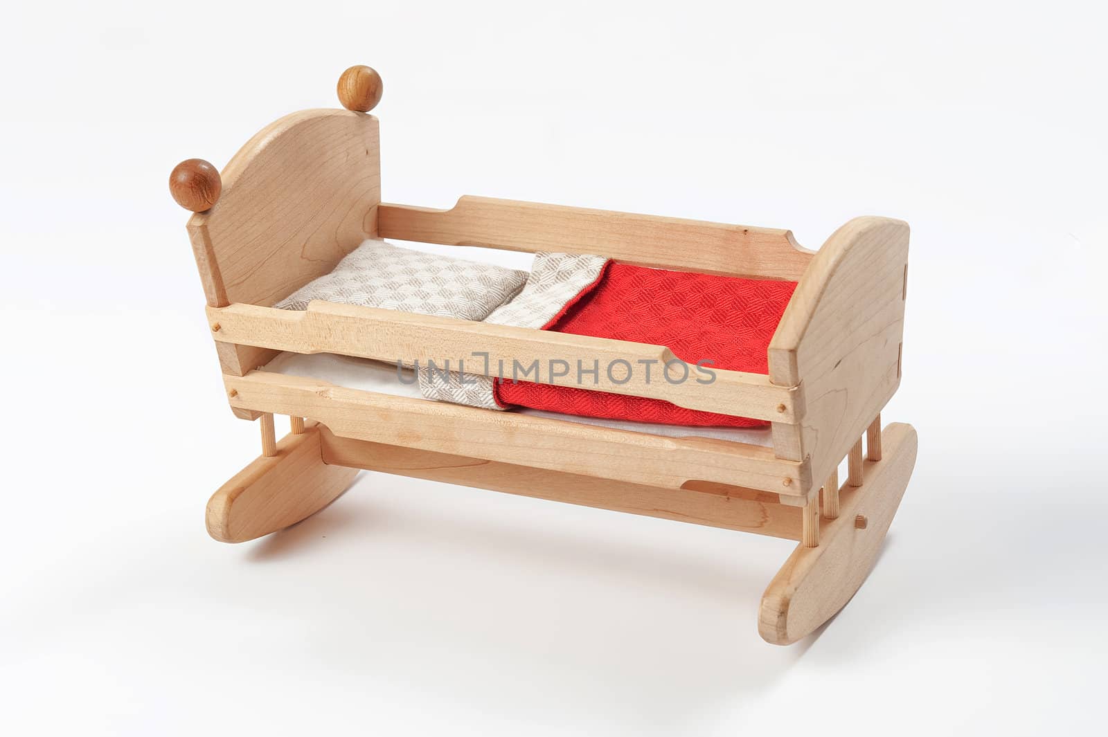 Wooden toy cradle isolated on white background