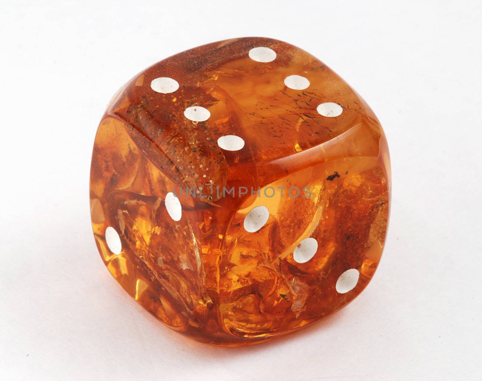 amber cube macro isolated on the white background