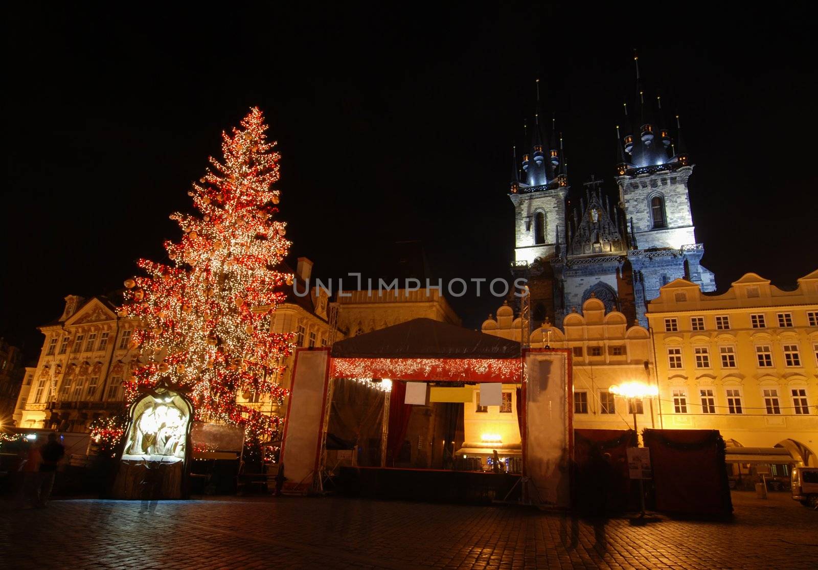 Old Town Square in Prague with Tyn Cathedral during the Christmas celebrations at night with long exposure