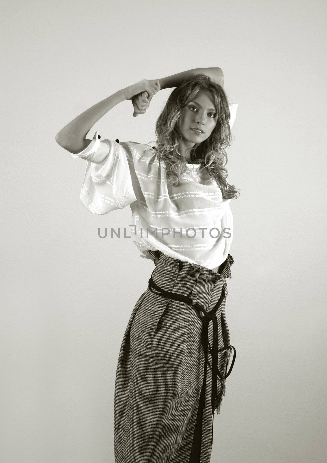 The beautiful young blonde in a white jacket. b/w